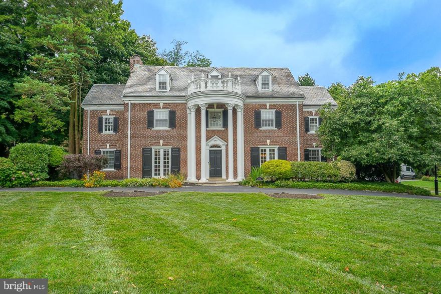 This stately 5 bedroom, 3 and a half bath, 3,852+ square foot Georgian Colonial in the highly desired Merion Station neighborhood perfectly blends a timeless ambiance with high-end, modern amenities.  The center hall entry welcomes you into the home and showcases hardwood floors that flow throughout the home.  The bright and spacious living room with wood burning fireplace is both formal and cozy, perfect for game nights or visiting with friends.  Just off the living room is the home office or den with built-in bookshelves and views of the grounds.  The must-see updated kitchen and dining area has it all!  You will immediately notice the exposed beam, brick columns, and the huge 14’ center island with Chef's prep sink and bar style seating.  Other features include custom white shaker cabinetry, White Carrara marble countertops, brand-new stainless-steel appliances including 2 built-in GE Monogram refrigerators, 6 burner gas stove, double oven and Bosch dishwasher, and the open dining area with double doors to the slate terrace.  This truly is the heart of the home!   A convenient half bath rounds out this floor.  Head upstairs to the primary suite with huge custom walk-in closet, and gorgeous, updated primary bath.  With Italian Carrara marble tile flooring, double marble vanity and huge walk-in shower with 3 shower heads and separate toilet room this bathroom does not disappoint!  Completing this level is a large bedroom with separate room ideal for a desk/workspace or playroom, additional bedroom, and full hall bath.  The 3rd floor offers two additional sizeable bedrooms and full hall bath.  The finished lower level has family room with wainscoting and hearth, laundry, and storage.  Step outside and enjoy the beautifully manicured grounds from the terrace or the wonderful outdoor gazebo located on the brick patio.  Two-car de-attached garage.  Award-winning Lower Merion School District.  This home offers both privacy and convenience, walk to parks and Houses of Worship, minutes to train, shops and restaurants.  This home won’t last, schedule a showing today!