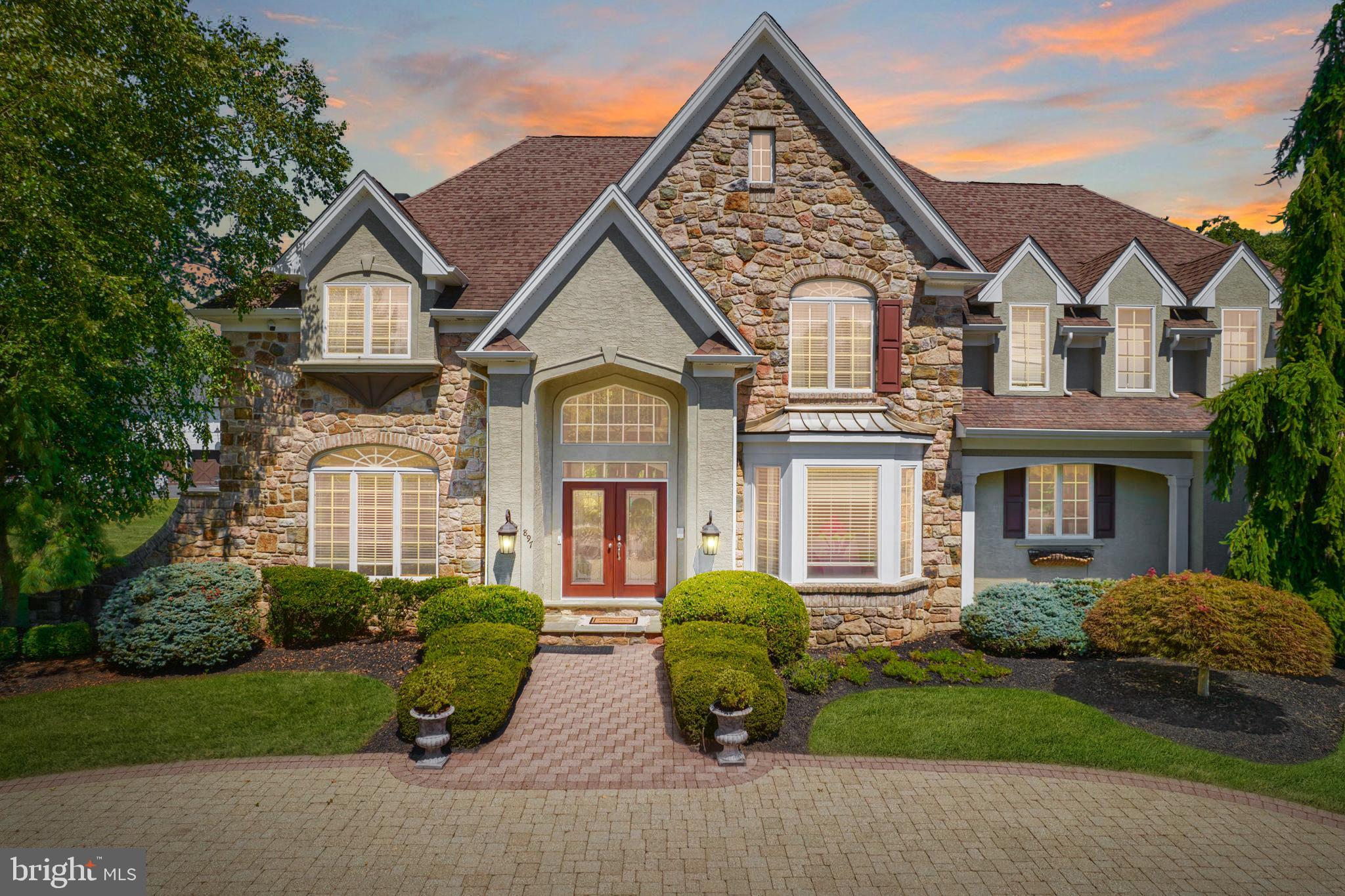 Welcome to 897 Summerset Place! This stunning 4 bedroom 4.5 bathroom home features vaulted ceilings, an open floor plan, Smart House technology, and a heated pool. Located in the highly desirable Greystone community, this home sits on 1.21 acres of land. As you enter the home you will immediately notice the marble floor, leading into the great room that is equipped with a beautiful wall of windows along with a fireplace. The chef's kitchen offers hardwood flooring throughout, granite countertops, stainless steel appliances, a 2-tiered island with seating for four, and TONS of cabinetry for storage! This floor also has a half bathroom and sun room attached to the kitchen with tons of natural light. As you make your way upstairs you will find the spacious bedrooms and three full bathrooms. The primary bedroom includes a large walk in closet with plenty of storage space, automatic lights, and glass doors leading to your juliet balcony! This gorgeous primary bathroom has everything you could need and more. Featuring a spa shower with 9 shower jets, stand alone tub, 2 sinks, and heated floor, this is the bathroom of your dreams! All 3 of the other spacious bedrooms provide ample closet space. Finally, 897 Summerset Place is complete with a fully finished basement that includes another full bathroom, a workout room, bar area, and entertainment room. This is truly the perfect place to entertain guests throughout all seasons! Walk out from the basement to your fenced backyard with patio space for entertaining & grilling, your heated pool and hot tub. In close proximity to all of the bars, restaurants, and grocery stores that Ambler has to offer, this home has it all! Schedule your showing today.