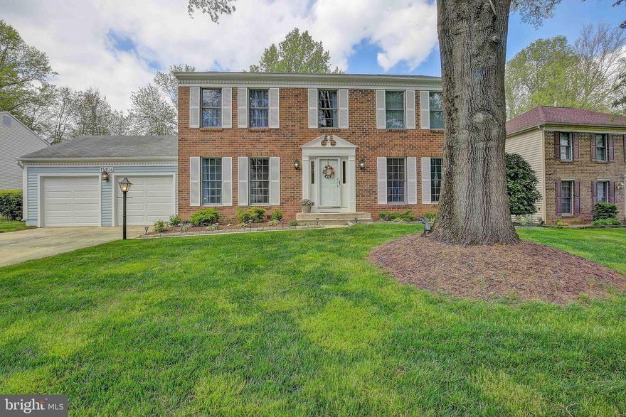 Beautiful colonial home in sought after Tall Oaks Crossing located in the city of Bowie. Original home owners who have taken great care and maintained the home since it was built. So many wonderful family memories made in this home and now is your chance to make your own. Wood flooring through out the main level that includes a spacious kitchen with a large island,  stainless steal appliances and a eat in area that is open and leads to a large family room with a brick fireplace to keep you warm during the cold winter nights. Plenty of room for main level entertaining with the formal dining room across from the formal living room as you enter the home that could also make a great office or playroom for the kids. Upstairs you have four nice sized bedrooms including a spacious primary bedroom with a big walk in closet and a updated primary bathroom that includes a separate sitting area to do your make up and get ready for the day. Plus a large room/man cave in the partially finished basement. Not to mention lots of storage space in the down there. Plenty of parking in your large driveway, two car garage and street parking on a quiet street near the end of a cul-de-sac.  Dont forget the  large deck outback for the warm spring and summer days that opens up to well maintained landscaping in the large flat backyard. Plenty of room for the kids to play or the pets to run around.  Community amenities including a Bike Trail, Walking path, Tennis Ct and Playground. If you are a commuter to DC/VA or Baltimore the location does not get better than this for work, shopping or entertainment.