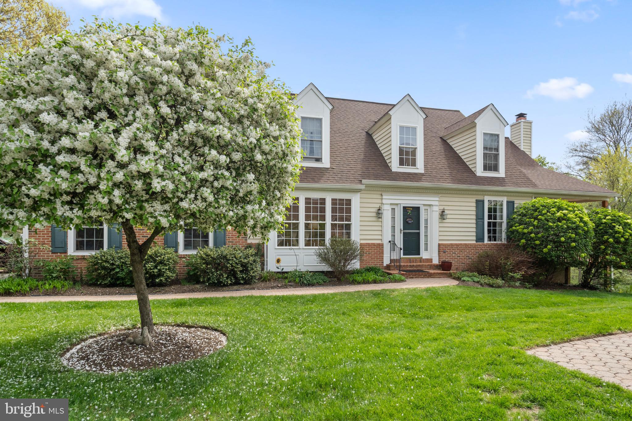 Rarely does a primary suite on the first floor become available in sought after Mills at Rose Valley. The peaceful & tranquil lifestyle that you have been waiting for. This gorgeous walkable community is nestled amidst beautifully landscaped tree lined streets, open meadows and picturesque views of the meandering Ridley Creek. A wonderful paver walkway leads you to the well landscaped front entryway. Hardwood floors throughout the first floor! Entry foyer, study with elegant French doors, built ins and large picture window & crown molding, formal dining room with crown molding, eat in kitchen with cherry cabinets and gleaming corian counter tops. Sliding glass doors lead to an amazing deck with stunning views of Ridley Creek. Family room with wood burning fireplace and soaring vaulted ceiling. Powder room, hallway with accent lighting, French doors into the primary suite, lavishly appointed primary bath and large closet space. Laundry room and entrance to the 2 car garage. On the second floor there are two nicely sized bedrooms and a Jack & Jill bathroom with ceramic tile and a skylight. The rear bedroom has an overlook to the family room and views out the back yard. Finished walk out lower level with gas fireplace and kitchen area ideal for entertaining and French Doors that lead to a slate patio. Another large room for crafts and a full bathroom. The HOA covers prompt snow removal on driveways, streets and sidewalks, lawn care and house perimeter maintenance. Tranquil quiet neighborhood. Close to the Airport, sought after Wallingford Swarthmore School District. Very close to the Elementary School, Middle School and High School. This is the perfect location, close to downtown Media and the Wallingford Train Station.
