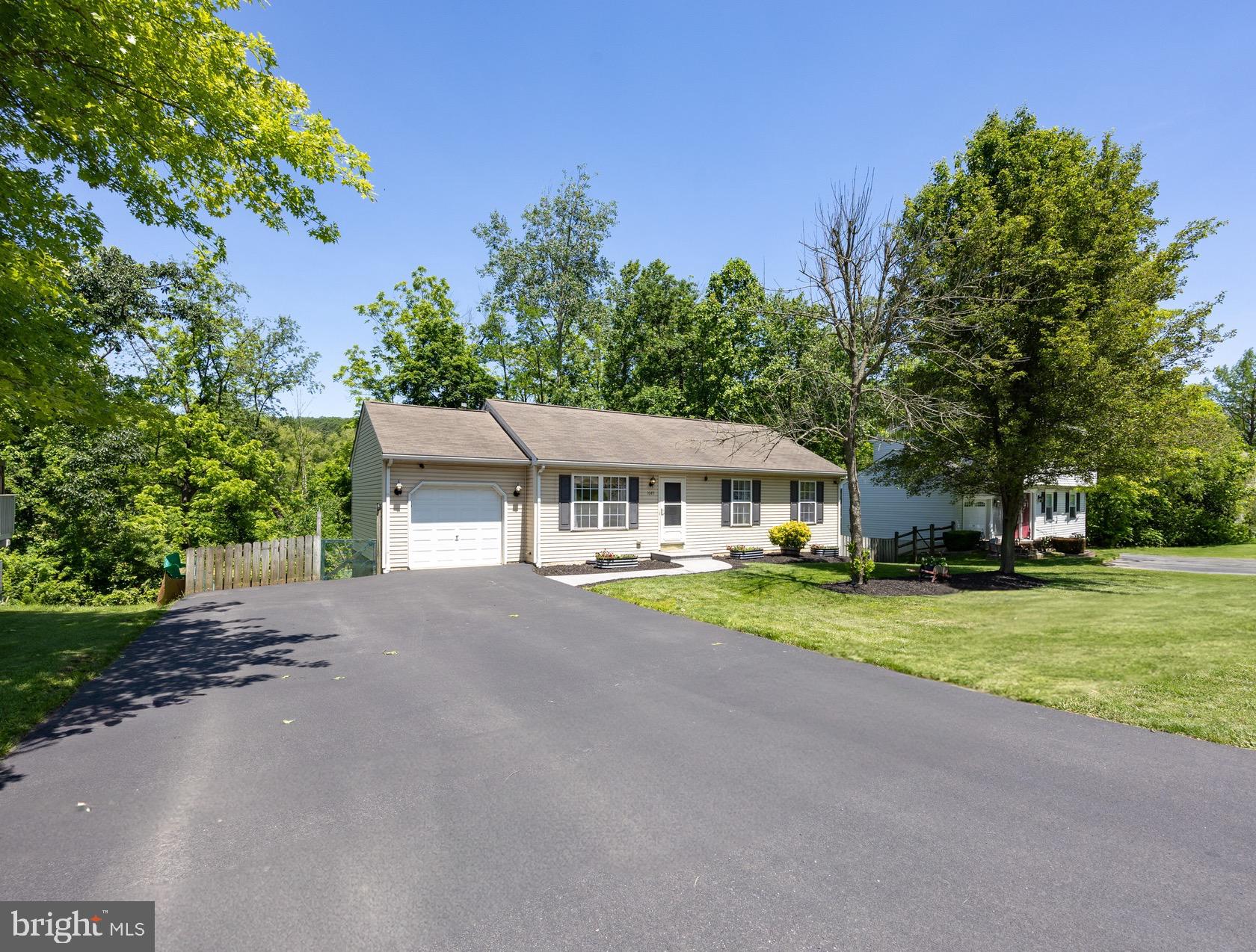 Welcome to 1649 Valley Road – where charm meets thoughtful updates and comfortable living! This adorable ranch home is just as inviting inside as it is outside, featuring a host of recent improvements that make it truly move-in ready. Step inside and you'll immediately feel the pride of ownership, with upgrades including a new AC unit (2022), hot water heater (2022), luxury vinyl plank flooring (2021), a stylish new patio (2020), and a beautifully remodeled primary bathroom (2018).
Offering three spacious bedrooms and two full bathrooms, along with a bright galley kitchen and an open-concept living/dining area that’s perfect for everyday living and entertaining. The finished basement adds incredible versatility—ideal for additional living space, an in-home office, gym, playroom, or media space—and don’t miss the unique bar closet, a fun bonus for hosting those patio parties!
Step outside to your private, fenced-in backyard—complete with a lovely patio space that's perfect for summer barbecues, peaceful morning coffee, or curling up with a good book. This home checks all the boxes for comfort, style, and functionality!