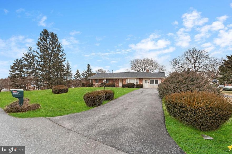 Spacious 3,000+ Sq. Ft. Ranch-Style Home in Spring Garden Estates. Featuring original hardwood floors with a gleaming finish, a charming lower-level bar and gathering area, and a cozy brick fireplace with a gas insert, this home blends classic charm with modern comfort. Enjoy a spacious walk-out basement leading to a patio, a nearly level corner lot, and a large 9x11 shed with a tiled floor for extra storage. Conveniently located near shopping, restaurants, top-rated schools, and the scenic Magruder Branch Trail. Easy access to I-70 & I-270 makes commuting a breeze. 📍 Key Features: ✔️ 3,000+ sq. ft. of living space ✔️ Original hardwood floors & ceramic tile ✔️ Walk-out basement with bar area ✔️ Brick fireplace with gas insert ✔️ Large corner lot with patio & shed ✔️ New HVAC (2018) & gas heat ✔️ Convenient location near shopping & trails