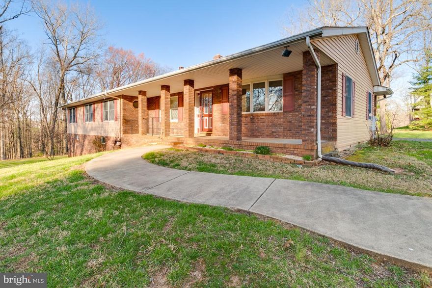 Custom built, one of a kind 5 bed 2 bath rancher nestled on an 8-acre mostly wooded lot.  A rare gem in 21784.   There is a large, maintenance-free deck off the ample master bedroom that allows natural light to fill the room.  Use the 5th bedroom as an in-home office.  The kitchen and bath offer heated floors for comfort you never knew you needed.  The lower-level walkout has a two-bedroom, full bath in-law opportunity with a full kitchen.   The options are endless, the location is ideal, and the time is now!