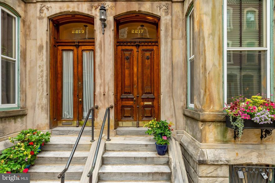 PRIME FITLER SQUARE,  2217-19 Delancey Place # 2 is a Pristine 2 Bedroom, 2.5 Baths condo boasting 1,649 Sq Ft.    This completely renovated bi-level unit has outstanding architectural detail and character,  located on a quiet, tree lined street.  
The classic first floor private vestibule entrance opens into the main level.  At the front of the home, to the right from the hallway, you will find the first bedroom with en-suite bathroom, and generous 3 sets of closets and ample light from two tall south facing windows.  

This same level hosts a beautiful completely renovated kitchen with plenty of storage and pantry that opens to the extra large living and dining area.  Cathedral ceilings, tall windows, hardwood floors, and a gas fireplace make this space absolutely wonderful.

The split floor plan leads you downstairs to the primary bedroom oasis, complete with custom cabinetry and bookshelves. Enjoy a new spa-like primary bath, a large walk-in closet, and a washer/dryer conveniently located nearby.  This level also features an entrance to a private, newly landscaped garden with lovely planters and a small fountain, perfect for al fresco dining during the warm months. The condo includes locked storage and separate bike storage. 

This home offers a short commute to University of Penn, CHOP, Drexel University and Amtrak's 30th Street Station.  Steps from Fitler Square, Rittenhouse Square, local parks, restaurants, cafes, tennis courts, Schuylkill Banks Trail, dog park and public transportation.  A MUST SEE !!!