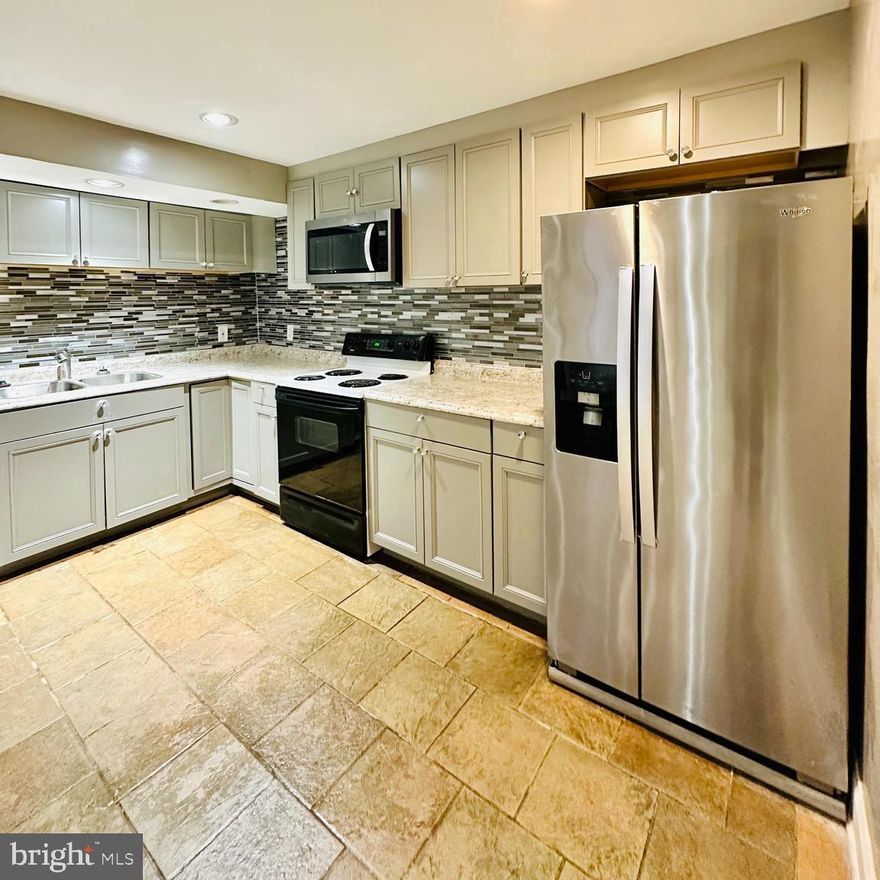 Welcome to YOUR spacious one bedroom with full kitchen with recessed lighting in Bowie, MD. An open floor plan at your service. Entertain & prepare your meals in the heart of your home, your spacious eat in kitchen, which includes stainless steel appliances - refrigerator, stove, microwave and space for full size table space for meals. Refresh your clothing in the stackable washer/dryer.  Updated flooring throughout the living and bedroom. Private separate rear entry slider door for convenient access. Parking space/visitor parking located in cul-de-sac on street parking included for convenience. YOU MUST register to TOUR

Located conveniently near Interstate 495, 301, major travel routes, shopping, dining, grocery and retail. SCHEDULE your showing appointment today!