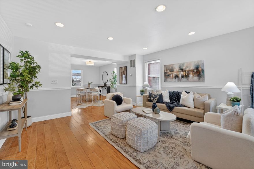 WOW - This is the One! Welcome to this 3Bedroom, 2FullBathroom, almost 2,000 SqFt, END UNIT rowhome that blends CITY LIVING with COMFORT, SPACE, and STYLE. Nestled in a Beautiful Residential Neighborhood with Phenomenal Neighbors! Walk up a few steps to the LARGE FRONT PORCH. Then through the front door into an OPEN CONCEPT MAIN FLOOR, accented by the Gorgeous Hardwood Floors, highlighting the ample space in the home. The large living room, dedicated Dining Room, and Updated Kitchen with Granite Countertops, Samsung appliances, and a comfortable KITCHEN ISLAND leads to the intimate rear BALCONY - Elevated well above ground-level the balcony is Perfectly Perched for a morning's coffee and overlooking a Large Backyard. If you're looking for outdoor space in the city... this home has Plenty! Back Inside - The upstairs level offers 3 bedrooms and a full bath with a large Jacuzzi SOAKING TUB. All the way downstairs – is the where the house gets even more Charming. The Fully FINISHED BASEMENT boasts a Large FAMILY ROOM, a 4th Bedroom, another Full Bathroom, and Full-Size Laundry.  To top it all off the carpet is Brand New (2026), the ROOF is brand new (2026), and oh-so many things have been updated throughout the home. Before leaving you'll feel a sense of PEACE AND CALM. That's because this is Not a flip! This is truly a ONE-OF-A-KIND that's been well LOVED and well CARED FOR. Welcome HOME! **** Property is Eligible for M&T’s Community Lending Impact Program (CLIP) of $7,500*****