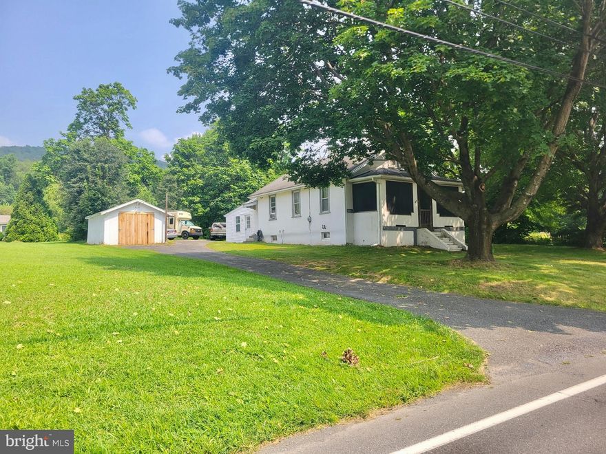 Come see this charming little home surrounded by open pasture. This property gives you the beautiful illusion of privacy. The one car detached garage is perfect for your lawn care needs.  The current owners did major renovations to  the home with the intentions of staying  so it was done with love and care. New paint and flooring throughout the home, new toilet and vanity in the bathroom, new fixtures throughout the home, updated electrical in 2007 by prior owner, new kitchen cabinets and counters. This property will need the septic system replaced