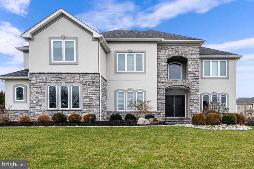 OPEN HOUSE CANCELLED FOR 3/9 - multiple offers. This exquisite 2018 North facing Tuskes home stands as a testament to luxury, sophistication, and craftsmanship. A meticulously designed interior, every facet of this home reflects the owners attention to detail and custom finishes with over $165k in upgrades. The heart of this home lies in the expanded gourmet kitchen and is a chef's delight - Wolf stove/wine fridge, double oven, sub zero fridge, Cove dishwasher, white cabinetry, an oversized Quartz island and pantry. The 2 story family room, with coffered ceilings, stacked stone linear gas fireplace, built in Sonos speakers and rear staircase is open to the kitchen and sets the stage for great entertaining. A large formal dining room for hosting all your events, this home accommodates both treasured family moments and grand entertaining. First floor office with french doors, an in law suite bedroom/flex space with a full bath and a powder room complete the first floor. The oversized primary suite is a sanctuary of comfort, featuring a tray ceiling, spa-like ensuite bathroom with dual shower heads, and 2 walk-in closets. 3 Additional well-appointed BR's with walk-in closets and 3 full bathrooms. A professionally landscaped backyard is complete with a large covered custom patio and outdoor kitchen; a private oasis for relaxation and entertainment. 3 car garage. Minutes from Rt 78, 33 and 22 for easy commuting, great shopping and hospitals. Public water, gas heat/hot water. Seller prefers early July closing.