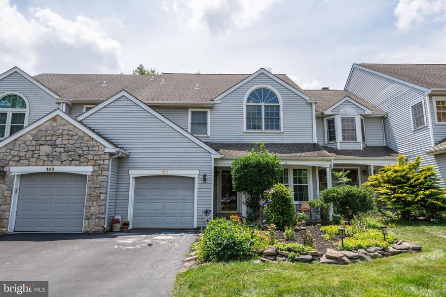 Beautiful townhome in the desirable Montgomery Greene neighborhood. Located on a premium lot with wooded views, this lovely 3 bedroom/2,5 bathroom home has a Finished Walk-out basement. NEW Roof 2016. All NEW carpets throughout the house 2023. NEW Water Heater 2020. NEW Air conditioner 2020. All NEW stainless steel kitchen appliances 2017. NEW Dryer 2023. NEW Sliding doors to Deck and from basement walkout in 2021. NEW Windows in formal Living room and Great Room in 2023. This popular Dover floor plan has generously sized rooms. The formal and informal areas are segregated. Enter this home through the covered front porch into the Formal Living /Dining rooms. The entire home has been Freshly Painted in a neutral shade in 2023. The kitchen is large w/island, gas cooking and stainless steel appliances. The breakfast room has volume due to the vaulted ceilings and leads onto the deck that overlooks the green backyard. The cozy Great room is bathed in natural sunlight and has a fireplace. A powder room completes this floor. The second floor houses two spacious guest bedrooms that share a bathroom off the hallway. The primary bedroom is large with vaulted ceilings, a sitting room and walk-in closet. The beautiful primary bathroom has both - a soaking tub and shower stall as well as double vanities. The laundry is also conveniently located on this floor. The lower level is open, fully finished and leads to the backyard through a glass sliding door. The natural light ensures that this space does not feel like a basement at all. N Penn School district. Amazing connectivity to highways, shopping, schools, places of entertainment as well as employment. Maybe this is your perfect home ! Schedule a tour soon.