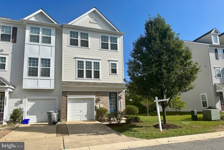 Welcome to this recently updated townhome, a fusion of elegance and comfort nestled in the heart of St. Mary's County.  As you step inside, you're instantly greeted by cascades of natural light, illuminating a spacious living area that boasts just under 2100 sqft of meticulously crafted space spread across three fully finished levels. Every culinary enthusiast's dream awaits in the modern kitchen fitted with all-new stainless steel appliances, glistening quartz countertops, and durable Luxury Vinyl Plank flooring. This end unit offers a sense of privacy and space, showcasing 4 bedrooms and 3.5 baths, ensuring room for everyone. The inclusion of a garage and a large composite deck makes this the quintessential home for those who cherish both indoor and outdoor living. But the allure doesn’t stop there; be prepared to immerse yourself in the community's resort-like amenities including a pristine pool for relaxation, scenic walking trails for your morning jog, and a delightful park perfect for family gatherings. And if convenience ranks high on your checklist, breathe easy knowing you're moments away from shopping, entertainment, and a quick commute to NAS PAX RIVER. This isn't just a home; it's a lifestyle, an experience, a statement. With limited properties like this, the moment to act is now—perfect place to live to enjoy all that SOMD has to offer.