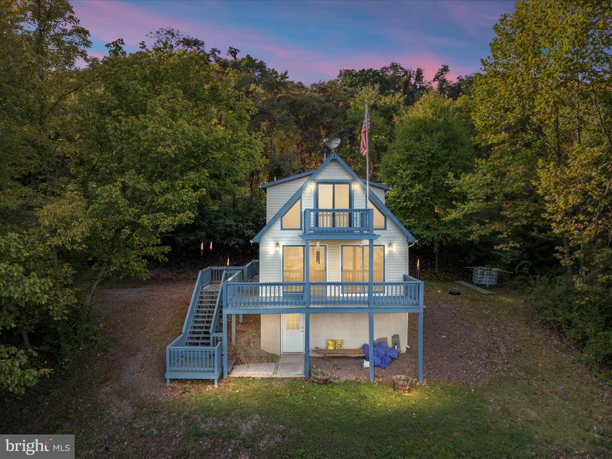 Escape to this Charming 2BR, 1BA Cabin perched atop a serene mountaintop! With an open floorplan, deck, balcony, and a finished basement for extra living space, this retreat is perfect for unwinding after a day of outdoor adventures. Nestled on over 5 private wooded acres, you’ll find ample opportunities for hunting and exploring the natural beauty around you. Enjoy breathtaking panoramic views that make this property a true gem for nature lovers and outdoor enthusiasts alike. Your perfect mountain getaway awaits!