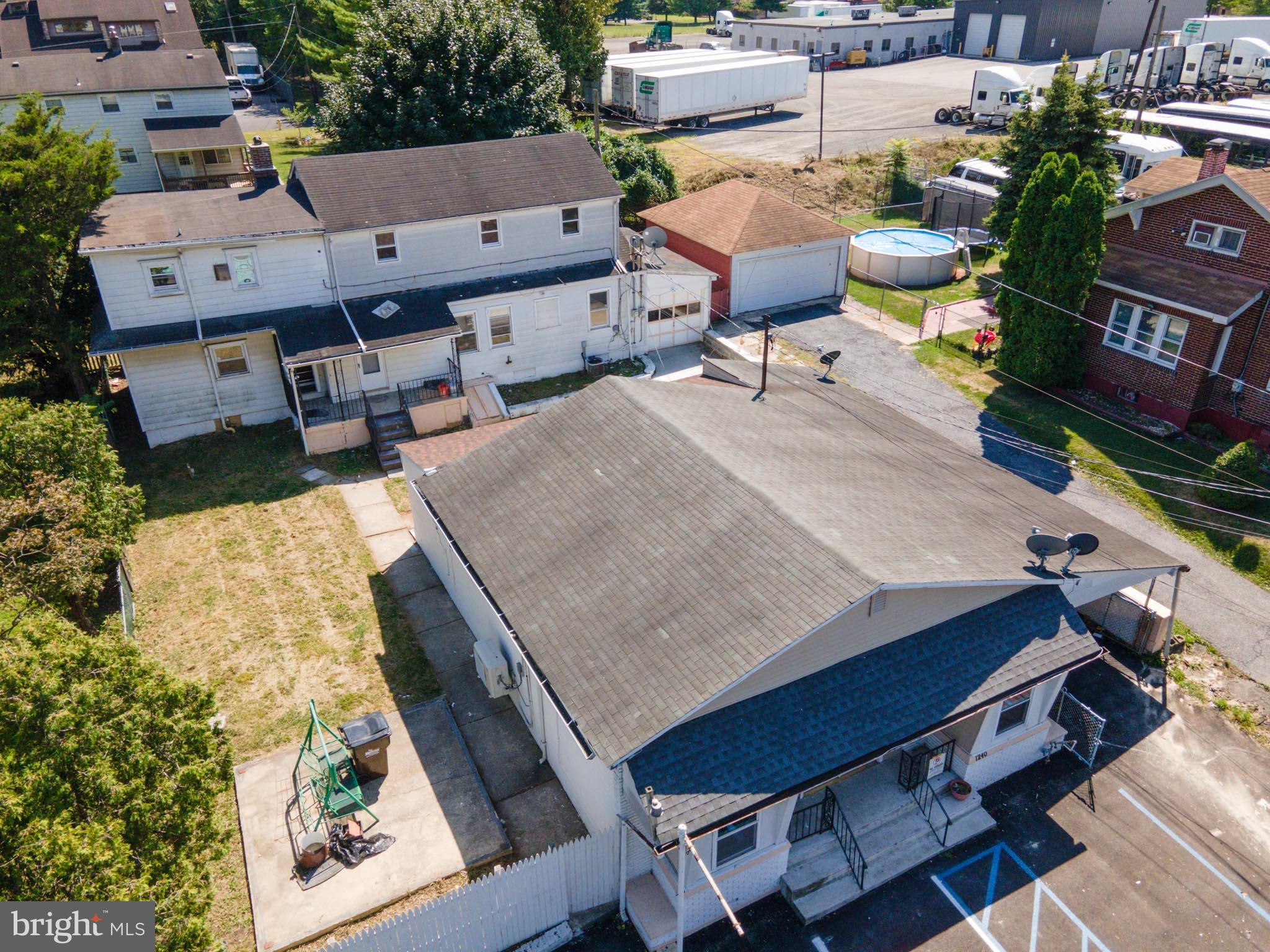 $62,400 Gross Income, $48,520 Net Income, 10% Cap. These prideful owners have invested over $125K to renovate and rebrand this fully occupied, cash-flowing, 3-unit investment property including a full renovation of all residential and commercial units plus a newly paved $25K parking lot. Each unit was modernized from top to bottom with fresh paint, new HW flooring, energy-efficient windows, newly tiled bathrooms, and all-new kitchens with GRANITE countertops, new appliances, & each tenant has their own washer/dryer. The basement was separated to allow for tenant storage. The 3BR unit is very large and has a lot of sunlight. The 2BR is spacious and has oversized Bedrooms. The commercial unit has brand-new temp-controlled split units. There is a total of 10 paved parking spaces for tenants and commercial. Long-standing commercial tenant has a 5-year lease and is in year 2 with the option to renew. Brand new sidewalks along the exterior. Electric and heat are all separately metered and paid by the tenants. The ownership group is listing over 25 multi-family units available in addition to this property. *Seller is a licensed real estate agent. *** PROJECTIONS with slightly higher rents come in at above $66,000 Gross.*** The 3-bedroom unit is on a month-to-month lease and market rent can be $2000 easily. The commercial unit is used by a great appliance team. They use it more as a supply then a showroom, but it was made to have showroom and offices with bathroom and new AC/ Heating