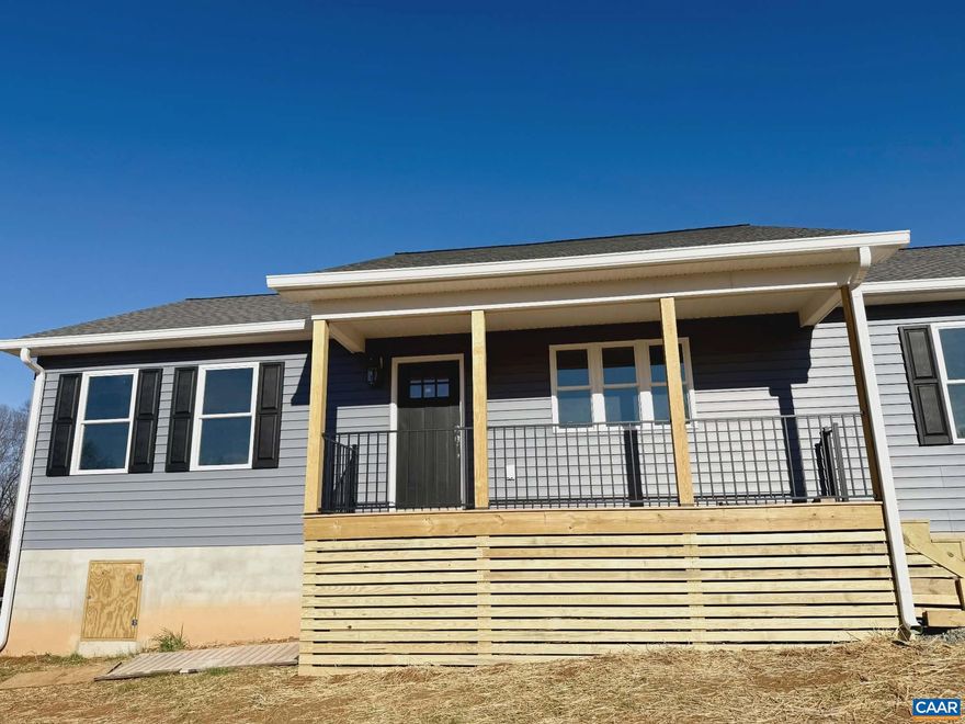 New construction built by DES Construction located in the heart of Scottsville on nearly two acres of land.  This residence features a split-bedroom design with three bedrooms and two full bathrooms. The kitchen is equipped with granite countertops, a large pantry, a breakfast bar, stainless steel appliances, and a tile backsplash. The home also offers a spacious family room with abundant natural light.  The master suite includes a walk-in closet, double vanities, and a tile shower. Outdoor living spaces include a covered front porch and a rear deck.  Owner is a licensed realtor in VA.,Granite Counter,White Cabinets