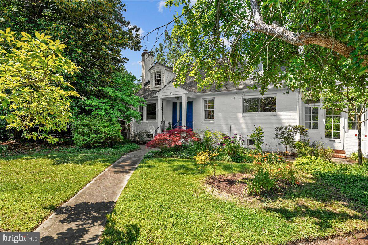 A rare opportunity in the heart of Wardour—one of Annapolis’ most sought-after communities. This special property offers incredible potential for those with vision. Set on a beautifully landscaped lot with restored meandering gardens, the home blends timeless character with flexible possibilities: renovate, rebuild, add a level—or even a pool. The charm of this home will completely captivate you. The rooms are spacious and inviting. Enjoy relaxing in the living room with hardwoods and a wood burning fire place for those chilly fall or winter nights. There is a main floor bedroom as well as an office, than could be a bedroom and one full bath. On the upper level there are 2 generous rooms and a full bath.
Inside, a custom-designed kitchen which still has wonderful charm—five years in the making—anchors the main living space, complemented by a breezeway, which is perfect for the gardner in you. Enjoy an afternoon tea on the charming sun porch. The home is being freshly painted, professionally cleaned, and staged to showcase its unique appeal.
Stroll through the back gardens which is expansive and backs to a conservation area for wonderful privacy.