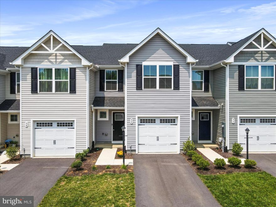 Back on the Market – No Fault of the Seller!  $5,000 Seller Concession!

Built in 2023, this like-new 3-bed, 2.5-bath townhome offers modern style and everyday convenience. The open main level features luxury vinyl plank flooring, a spacious great room, a sleek kitchen with quartz countertops, upgraded cabinets, stainless steel appliances, and a bright dining area—plus a convenient half bath and no-stair entry, perfect for unloading groceries. Upstairs, you'll find a laundry area with washer & dryer, a private primary suite, two additional bedrooms, and another full bath. Out back, enjoy a custom stone patio—ideal for relaxing or entertaining. Located in the Spring Mills School District, just 1 mile to I-81 and 15 minutes from Hagerstown.