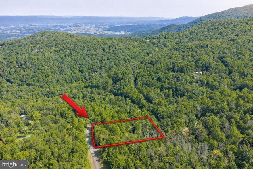 This is an incredible opportunity to own five adjoining lots being sold together as one expansive property totaling 3.99 acres in Stanley, Virginia. Located in the scenic Shenandoah Valley, this combined offering provides ample space, privacy, and flexibility for a custom home, family compound, or long-term investment. The land features wooded terrain, mountain views, and a peaceful rural setting, perfect for those seeking both tranquility and convenience. Access is available via U.S. Route 340 Business, with connections to U.S. Route 340 and nearby towns such as Luray, Shenandoah, and Front Royal. Interstate 81 is within a short drive, allowing easy travel throughout the region. The Skyline Lakes community offers Little Meadows Lake, approximately 1.5 acres, perfect for fishing and relaxing by the water. The bathhouse is available exclusively for Skyline Lakes residents and their guests, adding to the community's appeal. Close to the South Fork of the Shenandoah River, Skyline Drive, and Shenandoah National Park, this property is ideal for outdoor enthusiasts and anyone looking to enjoy the natural beauty of the area.