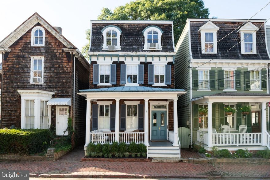 The historic Smith House is a charming 4-unit home in the heart of downtown Annapolis, steps from Main Street and in the city's most desirable area. The home is the perfect turnkey opportunity for owner-occupy, long-term, and short-term rentals. 
 
The property generates a remarkable annual income through its rented units, making it a profitable investment opportunity. It has been fully leased for the last ten years, with waiting lists for occupancy. Currently, three units are offered as a boutique Airbnb, receiving revenue in the top percentile compared to other Historic Downtown Annapolis properties. The apartments have received impeccable reviews and a Superhost status; you will not find a better ‘house-hacker’ opportunity. It is currently licensed through the city for both short and long-term renters.
 
The house has undergone significant renovations, including kitchens, baths, and flooring while holding true to the historic nature of this dwelling. Modern updates include glass shower enclosures, quartz countertops, floating shelves, recessed lighting, and Wi-Fi-enabled locks. These mix seamlessly with polished nickel fixtures, an original clawfoot tub, exposed brick, and restored original doors. In addition, it boasts a recently refinished standing metal seam roof, a new main water line and main sewer line, updated electrical, new gutters, and new plumbing in much of the home.
 
You and your tenants can experience the joys of being minutes from Main Street, City Dock, and the Naval Academy, with the best restaurants, shopping, and art galleries. Acton Cove Park is around the corner, and access to Spa Creek is at the bottom of the street. The Noah-Hillman garage is steps from the property, making it easy for overnight guests to park, and a water taxi stop allows them to explore Annapolis by boat. We welcome you to come visit and see what 107 Conduit has to offer!  Investment opportunities in Annapolis like this one don't come along often, don't hesitate!!!