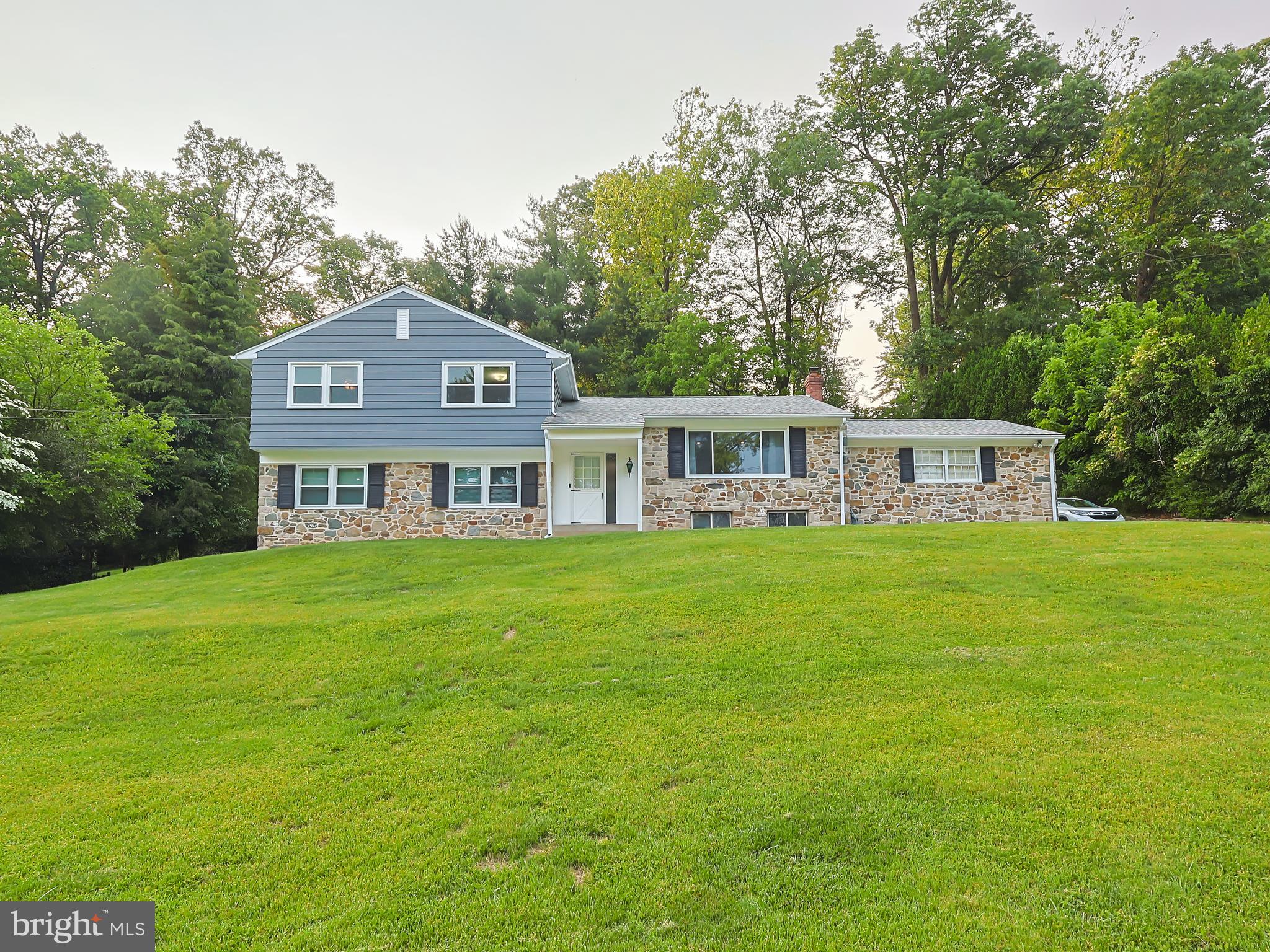 Welcome to 1950 Valley Rd, a stunningly renovated 3-bedroom, 2.5-bathroom home located in the highly sought-after Rydal section of Jenkintown. Designed for contemporary living, this spacious split-level residence features an open-concept layout, high-end finishes, and stylish upgrades throughout.
The heart of the home is the gourmet kitchen, boasting quartz countertops, stainless steel appliances, a designer tile backsplash, a large center island with seating, and open sightlines to the dining and living areas—perfect for both daily living and entertaining.
Step into the spa-inspired bathrooms, where you’ll find frameless glass-door showers, modern vanities, elegant tile work, and upscale fixtures that add a luxurious touch to your daily routine. The primary suite offers a serene retreat with its own private bathroom, beautifully appointed with sleek finishes and walk-in shower.
Enjoy wide-plank luxury vinyl flooring throughout the home, energy-efficient recessed lighting, and oversized windows that flood the space with natural light. The large family room provides a cozy yet spacious area to relax, while the unfinished basement offers ample potential for storage, a gym, or future expansion.
Outdoors, the private backyard is ideal for entertaining, gardening, or simply unwinding. Additional highlights include a two-car attached garage, long driveway, and an unbeatable location just minutes from Whole Foods, the Rydal train station, Abington schools, and local shopping and dining.
Property Highlights:
* 3 Bedrooms / 2.5 Bathrooms
* Fully renovated open-concept design
* Gourmet kitchen with quartz countertops and stainless steel appliances
* Frameless glass shower doors and luxury bathroom finishes
* Luxury vinyl flooring throughout
* Recessed lighting and modern fixtures
* Spacious family room and unfinished basement
* Private backyard and two-car garage
* Prime location near transit, shopping, and top-rated schools
Move right in and experience the perfect blend of style, comfort, and convenience in one of Montgomery County’s most desirable neighborhoods!