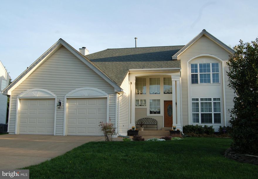 This Home with Wow You! Meticulously Maintained 3 Level Home With a Gorgeous View of the Pond. Features Hardwood Floors on Main and Upper Levels, 4 Bedrms 2.5 Baths  Detailed Molding 2 Story Entry Updated Kitchen with Breakfast Bar  Family Room w/ Wood Burning Fireplace  Master Suite w/Luxury Master Bathroom Partially Fin. Basement ,Patio Fenced Backyard&Beautifully Landscaped. Move-in Ready!