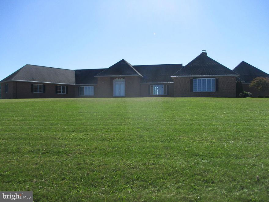 One of a kind 4 BR 4 BA brick Home. 5,100 sq. ft. + 3 car garage. Situated on 23.47 elevated acres with unbelievable panoramic views of Pleasant Valley and surrounding farming community. Living area on one level with full unfinished basement. Views from every room. Massive amount of closet space The opportunities are abundant with this property.