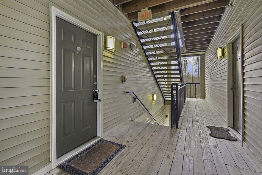 LEASE AGREEMENT signed.  New Rental Property March 14*Move-Ready! This immaculate, sunfilled, spacious 2 BR/2 BA condo features: Attached Oversized Garage (Bonus extra storage space) w/Plus driveway space for second car, 2 Large bedrooms each with spacious walk-in closets, Freshly painted w/neutral colors, New Carpet & Padding, Private Balcony-perfect for morning coffee or teleworking, Well-maintained by Longtime owner who renovated/updated his condo.  Gated community complete with community amenities:  Outdoor Swimming Pool, Exercise Room, Business Center,  TotLot Playground, Verizon Fios/Cox Cable available.  Don't miss this opportunity – schedule your tour today and make this beautiful condo your new home! *Please note professional photography and floorplan of Condo*