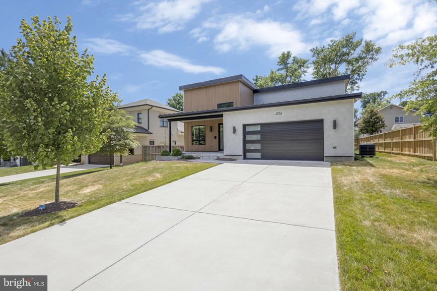 Welcome to contemporary elegance in this stunning 4-bedroom, 2.5-bathroom modern home, custom-built in 2021 by AV Architects. Nestled in the Pimmit Hills neighborhood, this property boasts a seamless blend of style and comfort. Located just minutes from Tysons Corner, this home offers easy access to world-class shopping, dining, and entertainment. Commuting is a breeze with quick access to major highways and public transportation, providing a convenient route into downtown DC. Step inside to discover an open-concept living space flooded with natural light, accentuated by sleek hardwood floors and designer finishes throughout. The highlight of the home is the expansive 20ft ceilings in the living area, creating a sense of grandeur and openness. The gourmet kitchen is a chef's dream, featuring stainless steel appliances, quartz countertops, and ample storage space. The spacious master suite offers a peaceful retreat, complete with a luxurious ensuite bathroom featuring dual vanities and a soaking tub. Three additional bedrooms provide versatility for guests, an home office  or a growing household. Outside, the landscaped yard provides the perfect backdrop for entertaining or relaxing, with plenty of room for outdoor dining and recreation. Located in a desirable neighborhood, easy access to Tysons Corner and  to major commuting routes, this one-of-a-kind custom build offers the ideal combination of sophistication and convenience. Don't miss your chance to call this exquisite property home.