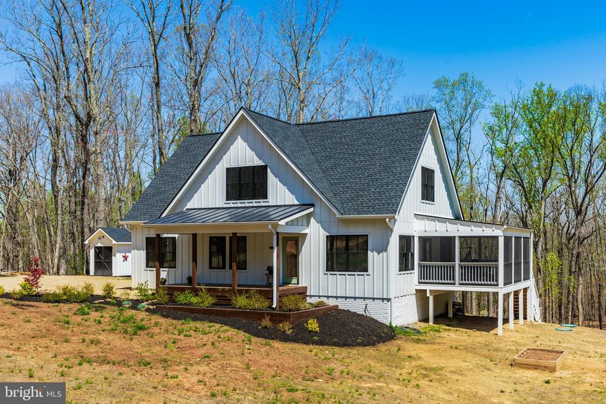 Modern Farmhouse built with 2 by 6 walls, James Hardy Board and Batten Siding, and gorgeous
black double hung windows by Pella. Less than a year old! Shiplap ceilings throughout the main level and Hunter ceiling fans in every bedroom. Beautiful sliding barn doors throughout the house too! Bright open kitchen with a walk-in pantry, stainless steel appliances and matte black countertops. Aqua guard laminate, tile, and wood flooring. The two upstairs bedrooms rooms each have Mitsubishi mini-split cassettes with individual thermostats providing separate and highly energy efficient climate control. Enjoy the huge screened porch right off the Great Room and the "rocking chair" front porch too.  A fun firepit and raised bed gardens made of cedar and wild blackberries, blue berries and wildlife abound.  The basement area is climate controlled and has a whole house filtration system. The sellers use it for storage and it is clean and dry. There are two sheds by the house, the larger one can accommodate a tractor. The many trails around property start behind the shed going down into woods, and there is still plenty of room to put a huge garage or barn or workshop ... and yes, there is INTERNET! AT&T, Verizon, and T-Mobile all get good service here. Make your dreams come true on your own six VERY private acres.