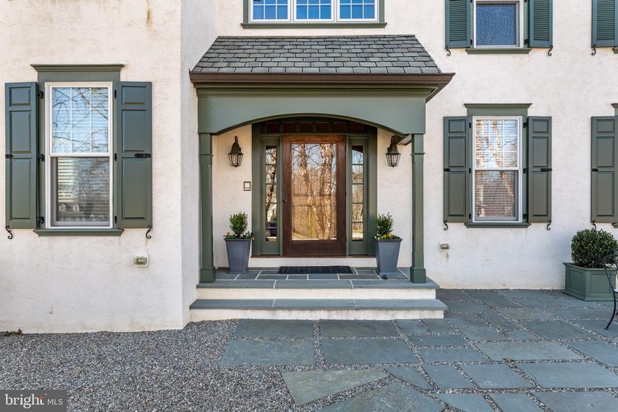 Stunning, custom Farmhouse with timeless integrity and attention to detail beyond compare with hardwood floors and unique details throughout. The design of this beautiful and inviting home is rooted in the combined thinking of its owners and builder and is the ideal family home that offers opportunity for grand entertaining but also comfortable family living. It is perfectly situated on an acre that is beautifully landscaped and is on a quiet cul-de-sac just steps from the Episcopal Academy campus. Masterfully built of superior craftsmanship and quality, the 10' tall first floor showcases a welcoming front to back foyer that opens into a gracious Living Room with gas fireplace, spectacular Dining Room with  built-in corner cabinets, Office with built-ins and Chef's Kitchen with 2 Wolf ovens, Wolf  Stove top , a full size Sub Zero refrigerator, a full size Sub Zero freezer, a Miele dishwasher, 2 Islands, a Breakfast Room with a surround of windows and a sliding door that opens to the back patio. The comfortable Family Room has a coffered ceiling, beautiful windows and a wood burning fireplace. The Mudroom has radiant heat floors, soapstone counter tops, a soapstone farmer's sink, custom cabinetry, a pantry, built-in cubbies, a powder room and a door to the 3-car heated garage. The second floor offers a gorgeous Primary Bedroom with a sitting room with vaulted ceiling and a gas fireplace, two walk-in closets, a spa like primary bathroom with a large shower, tub, and double sinks. There are 4 additional large bedrooms with bathrooms and large closets, a study/homework area and laundry room on the second floor. The third floor is finished and offers plenty of storage. The extraordinary lower level has an abundance of space for play, Tv/gaming area, a full bathroom and plenty of room for storage. It is plumbed for a kitchen and has 2 sets of French doors out to a back patio with stairs leading up to another sunken patio with a firepit that is also setup for a hot tub.  Additional stairs lead to additional backyard patios. The backyard offers privacy, patios, an outdoor kitchen, different areas for gathering, plenty of room to play, gardens and specimen plantings.  The back up  generator provides additional safety and security.  All of this just minutes to downtown Wayne, Paoli and easy access to major roadways for an easy commute to downtown Philadelphia and trains to NYC in the highly sought after White Horse Community!