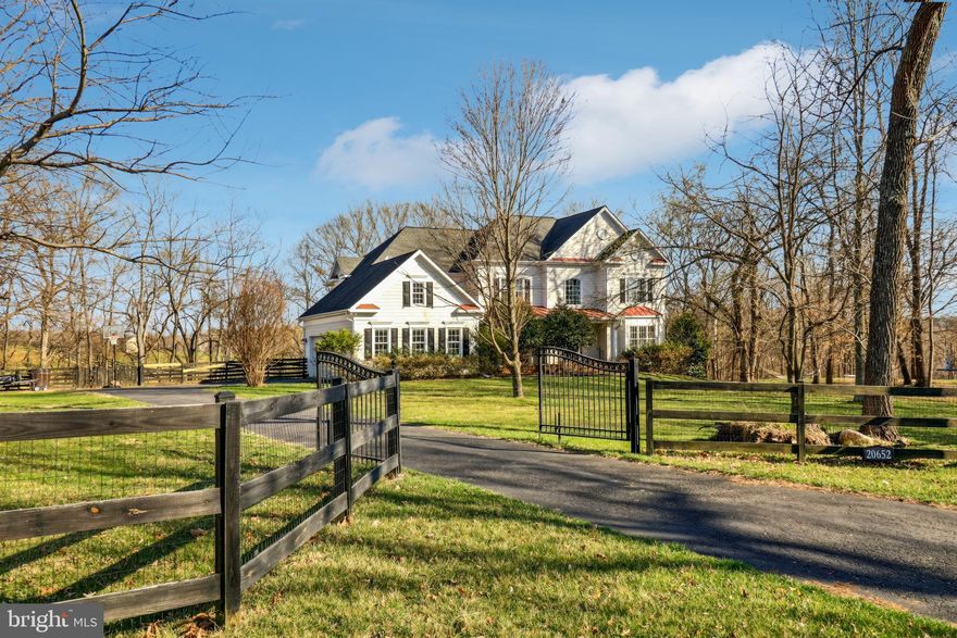 Offer Deadline Sunday 3/30 at 5pm.  Relax with in private seclusion!  This is a custom built home in the Heart of Wine Country.   Over 6,200 sq ft of finished living space on 3 levels.  This amazing kitchen is open and bright with tons of storage and cooking space for the resident chef!  The family room features a wood burning fireplace with stone surround, coffered ceilings and access to the huge rear deck that overlooks  acres of trees, a creek and green space. The primary bedroom features dual bathrooms, a walk through shower, soaking tub, large closets and a private seating area.  Three additional bedrooms up with baths. The basement is a dream with  a wet bar, media room option, exercise room, and legal guest suite. Walk out to a stone patio and fully fenced lot.  New septic system installed in 2019. New well 2024 & water filtration system in 2021.  Welcome Home!