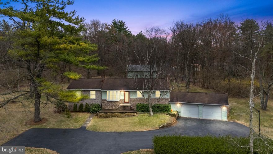 Nestled on 3 picturesque acres, this 3-bedroom, 1-bath home offers peaceful country living with breathtaking views. Inside, you'll find a welcoming floor plan featuring a spacious living room, a bright dining area, and a well-equipped kitchen. The finished lower level provides additional living space or ample storage, while the oversized 2-car garage ensures plenty of room for vehicles and equipment. Step outside to enjoy the tranquility of the back patio, the perfect spot to unwind and take in the serene landscape. The expansive yard offers endless possibilities for outdoor activities or simply soaking in the natural surroundings. With easy access to Bellefonte, State College, and Bald Eagle State Park, this property offers both privacy and convenience.