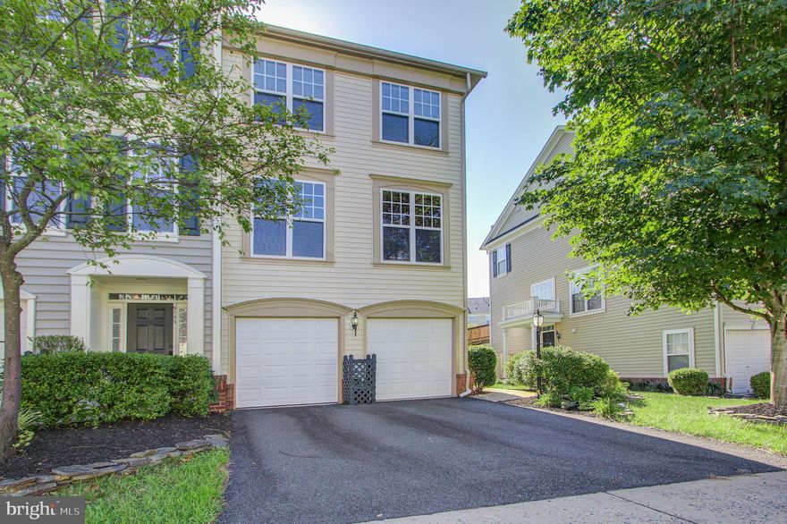 Wonderful end unit garage townhouse in Victory Lakes! Gleaming wood floors on main and upper level. Kitchen and has been beautifully updated with granite countertops, tile backsplash and stainless steel appliances. Large open floorplan on main level. Deck off kitchen. Lower level family room with gas fireplace, half bath and walk out doors to ground level patio. Fenced backyard. Primary bedroom with vaulted ceilings, large bathroom complete with dual vanity, soaking tub and separate shower. Laundry on bedroom level. Schedule your tour today!