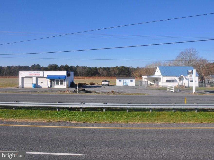 RARE OPPORTUNITY TO LIVE AND WORK AT SAME LOCATION. FRONTING ON BUSY OCEAN HIGHWAY (RT 13) WITH 2 EXISTING COMMERCIAL ENTRANCES. IT COULD BE USED FOR MANY TYPES OF BUSINESSES.   NO   CITY   TAXES.    THE 1080 SQUARE FOOT HOME HAS A LIVING ROOM, DINING ROOM, EAT IN KITCHEN, UTILITY-MUD ROOM, 2 BEDROOMS AND A VERY MODERN BATH WITH CUSTOM TILE SHOWER.  THERE IS A WALK-UP STAIRS TO THE FINISHED 486 SQUARE FOOT SECOND FLOOR.  LARGE REAR DECK, CAR PORT AND FENCED IN YARD.  THE OFFICE-GARAGE BUILDING IS 40 X 30 WITH TWO OFFICES, HALF BATH, STORAGE ROOM AND TWO LARGE SERVICE BAYS, THERE IS AMPLE PARKING FOR SEVERAL VEHICLES. ALSO INCLUDED IS AN ELECTRONIC SIGN PLUS A FREE-STANDING SIGN. YOU CAN USE ONE BUILDING AND RENT THE OTHER. MANY POSSIBILITIES FOR PRODUCING INCOME. THE EXISTING OWNER HAD A VERY SUCCESSFUL USED CAR SALES OPERATION AND AUTO REPAIR BUSINESS HERE FOR MANY YEARS. CALL TODAY FOR A PRIVATE SHOWING.