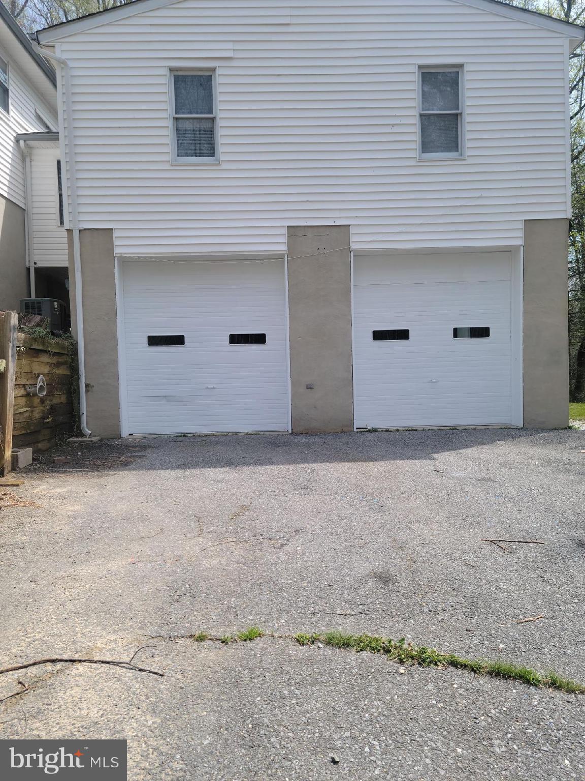Wonderful two bedroom apartment above detached 2 car garage . ... Completly remodeld kitchen and bath this has been completely updated... you have your own entrance above the garage, nice deck ... Great location.... Beautful yard. .. You get the use of the 2 car garage with this unit... the main house is also rented out... Utilities will be shared equally with all three units. ******