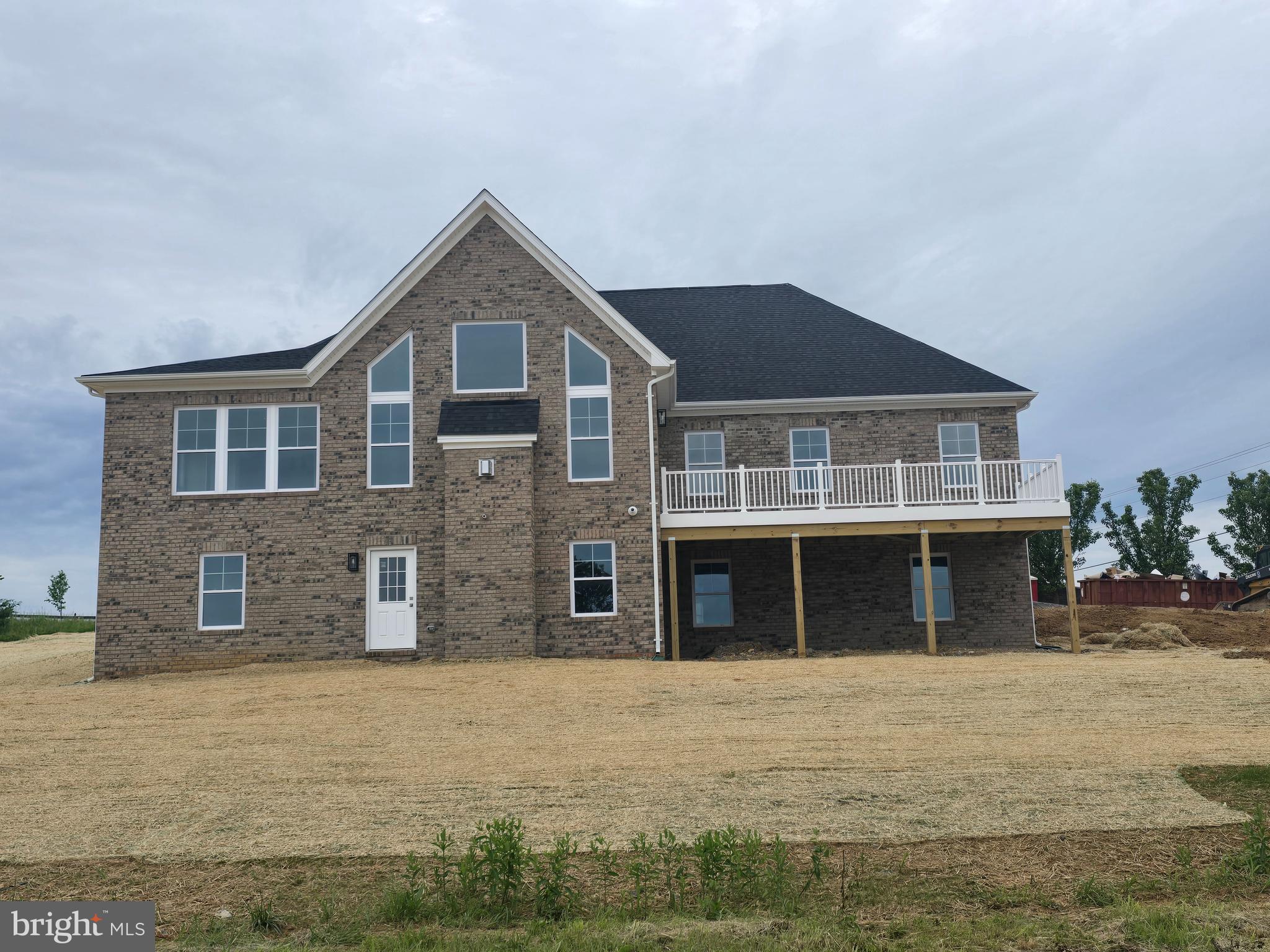 2 weeks away from completion! This all brick ranch home is bright and open with magnificent views. . The photos are of the interior are pics of the identical home that was previously built. . This home sits on lot with magnificent views of Signal Knob to the south and the blue ridge to the west. Million dollar views. NO HOA. Completion date will be June 15 2025. The walkout basement can be finished if you need a in-law suite.