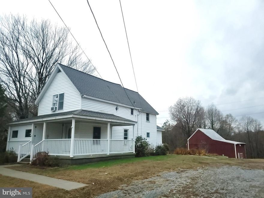 Charming Cape Cod home sited on a rolling 6.85 acre lot that offers a rural setting, but is super convenient to the many amenities of Prince Frederick, as well as Huntingtown, Dunkirk, Solomons, California, and more. A lovely wrap around porch invites you to sit awhile and enjoy the outdoors.  As you enter the main level from the front porch, you'll find the formal living room with access to the formal dining room, and a cute country kitchen, with enough space to accommodate  a kitchen table.  There's also a half bath with a  laundry area and a mud room that's by the rear door.  Take the stairs to the 2nd level and you will find 2 bedrooms, one of which has a large, separate sitting room.  On this level you will also find a full hall bathroom.  Within a stones throw from the house is a  huge red barn.  The barn consists of a front section with a 2nd level loft area that will need some fixing up.  The rear section of the barn could serve many purposes, such as auto repair, classic car or boat storage, wood working shop, and the list goes on.  The combination of the house and the barn makes this property a classic and unique opportunity for that buyer looking for such a set-up!  Schedule your showing before its too late! By the way, this property is eligible for 100% USDA financing!