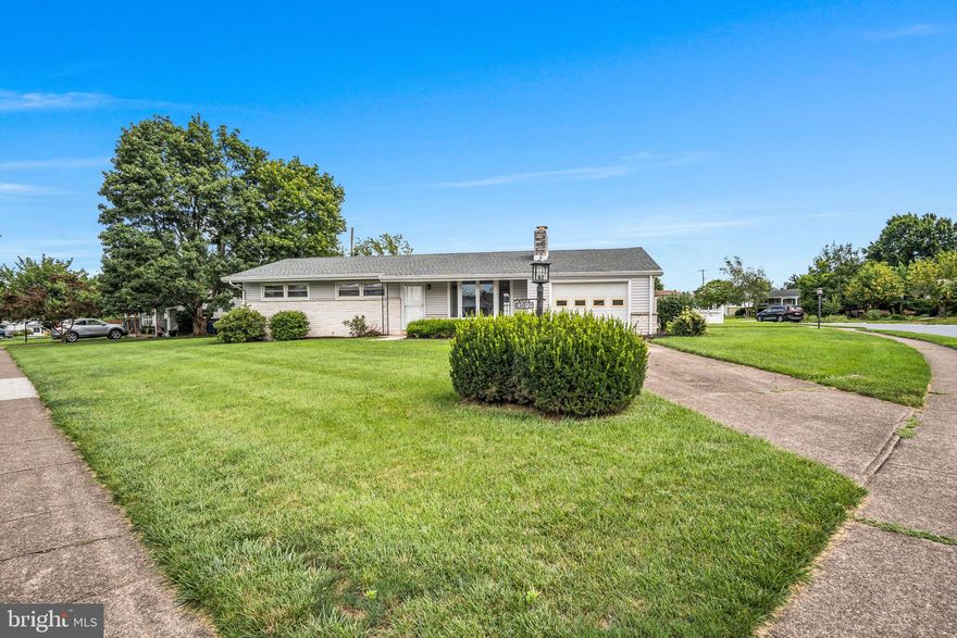 Don't miss this incredible opportunity! This beautifully updated 4-bedroom ranch home, ideally situated on a corner lot, offers the perfect blend of comfort and convenience. North Side Elementary School is just a few steps away!

Step inside and discover a gorgeous updated kitchen, gleaming hardwood floors throughout the main level, and a cozy fireplace for those chilly evenings. The fully finished basement is an entertainer's dream, featuring a large rec room and an additional bedroom/office space, perfect for guests or a quiet workspace.

Enjoy peace of mind with a newer roof, brand-new carpet, and fresh paint throughout. Plus, all three full bathrooms have been updated for a modern touch. With so much versatile space and just minutes to all amenities, this home truly has it all!