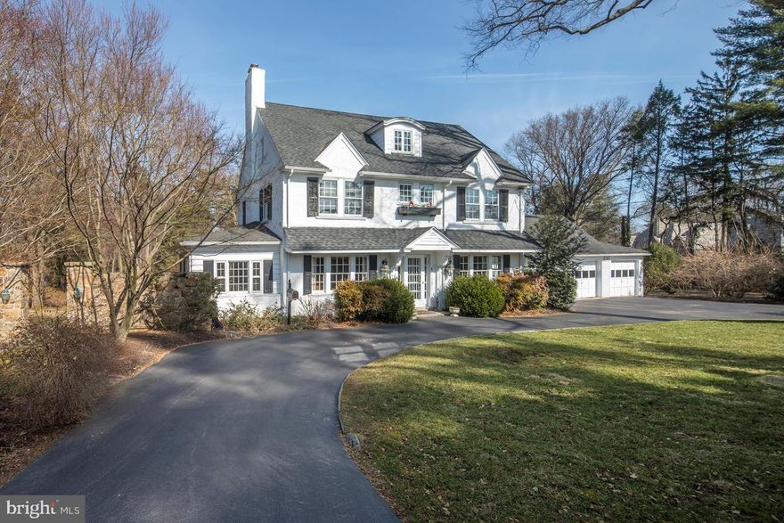 Welcome home to this beauty that will capture your heart with its fabulous location, picturesque setting and gracious living space. Live comfortably in a great neighborhood with homes far apart from one another on well-kept grounds, yet in a convenient location near it all. The sense of solitude is heightened by the positioning of the house, which faces the historic Merion Golf Club golf course, the site of several U.S. Open tournaments, affording stretching, scenic greenery views. Perhaps the best aspect of this gem is its incredible charm and character. This, plus all the modern amenities you desire resulting from a complete renovation, including newer roof, mechanicals, gas forced air heating, central air, main sewer line, and a 2-story addition creating a 1st-floor family room, 2nd-floor master suite with balcony and extended master bath, plus a 3rd garage bay. The spectacular grounds are enhanced by a circular drive, lovely landscaping and hardscaping. The interior ambience is elegant and cheerful, with abundant natural light streaming into every room through generous windows showing lovely views in all directions. The layout is fantastic, providing an easy flow of traffic and a seamless open plan for entertaining not typically found in older homes. A traditional center hall presents large openings to the living room with fireplace and dining room where you can host large gatherings. From the living room, 2 sets of French doors lead to the sunroom and peaceful stone terrace beyond for relaxing, grilling and watching the kids play on the lawn. The dining room connects to the spacious kitchen, which can also be accessed by the center hall, with tons of cabinetry, granite counters, SS appliances and access to the garage. The kitchen-family room are the hub of household activity. Large glass doors that lead to the terrace and wraparound windows in the huge family room with a fireplace and custom built-ins bring the outdoors in with gorgeous views. Ascend to the light and bright master suite with a vaulted bedroom ceiling, private balcony, sitting area with extensive built-ins, walk-in closet and luxurious en-suite bath, the ultimate retreat. Two additional bedrooms, a shared hall bath and laundry room complete the upper level. The private 3rd floor with 2 bedrooms, a full bath and separate HVAC is ideal for guests. There s also a basement with a 2nd laundry area. Close to all the Main Line has to offer, minutes from local rail stations, down the street from the  Pig and Whistle  and a quick trip to the airport. Live the dream!