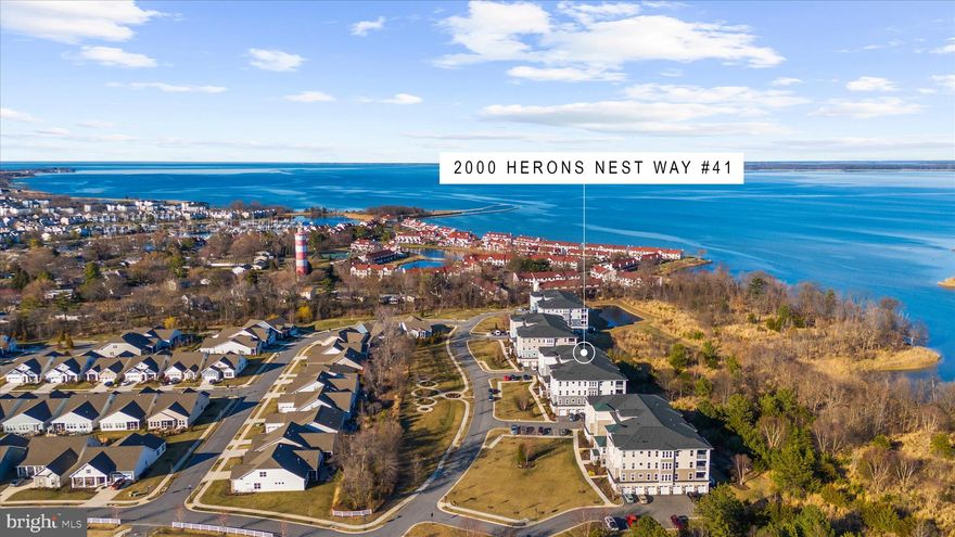 This rare, luxurious Severn penthouse in Four Seasons at Kent Island is available immediately and offers a lifestyle that blends comfort, elegance, and natural beauty. Built in 2020 and beautifully maintained, the residence features an open floor plan with abundant windows that fill the home with natural light, creating a warm, inviting atmosphere.  At the heart of the home is a stunning kitchen with a generous island and water views of the Chester River and Macum Creek, paired with high-end gourmet appliances that make everyday living and entertaining a pleasure. The spacious living areas are designed for easy flow and connection, while the three bedrooms provide peaceful retreats, and the 2.5 baths offer convenience and privacy for residents and guests.  This exceptional property offers direct access to Macum Creek, a pond, and sweeping views of the Chester River. Enjoy watching wildlife from your private balcony or take a short walk to the two nearby creekbank trailheads, behind buildings 1 & 3, with 2 kayak launch points, and picnic areas. Enjoy peaceful moments by the water, whether it’s kayaking, simply soaking in the serene views by the picnic tables of duck and Tundra Swans, or watching the deer graze, and the Osprey and local eagles soar from the sanctuary of your balcony. Brace yourself for brilliant sunrises that flood the interior with crisp light until late morning, year-round, as well as the westerly incandescence of sunsets whose warm light stretches lazily across Macum Creek at dusk to illuminate the far wooded bank.  Phase One living offers peace, privacy, and an unmatched setting with no construction disruption and expansive natural views instead of nearby buildings. The oversized attached garage with inside access provides secure parking, extra room for maneuverability, and additional storage, while the secure interior storage room on the main level adds even more practicality.   Residents enjoy access to the impressive 24,000 square foot clubhouse with a billiards room, casual lounge, library, fitness center, party and meeting rooms, and an indoor heated pool and spa. Outdoor amenities include a resort-style pool, tiki bar, concert space, fishing pier, day docking, kayak launches, trails connecting to the Cross Island Trail, tennis and pickleball courts, and dog parks.  Please view the 360 Video Tour to walk through this desirable penthouse condo virtually.