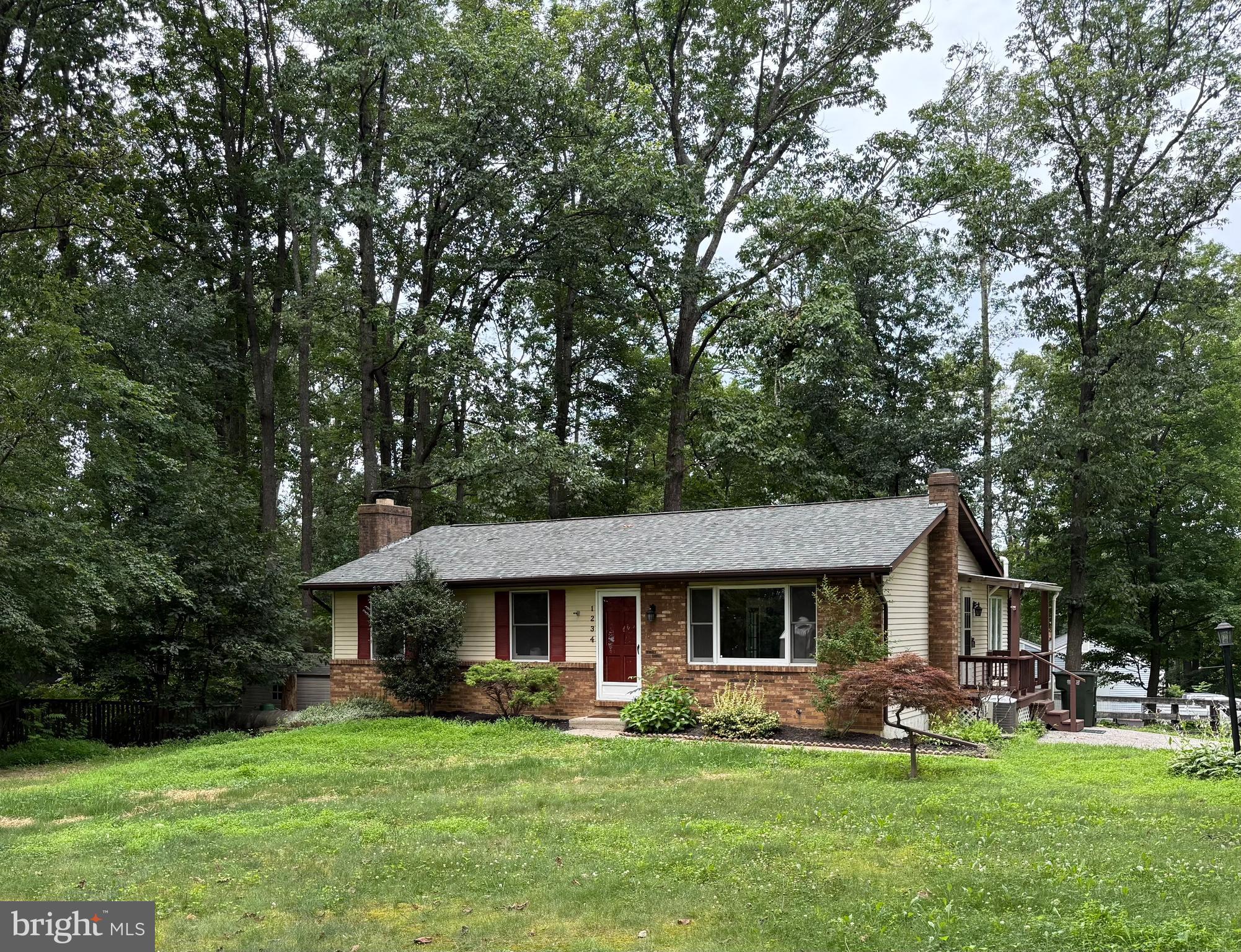 OPEN HOUSE SUNDAY, JULY 20TH 1:00-4:00. Look no further! Serene Stone House Village Rancher. 3 Bedrooms/Sunroom/Deck/Country Kitchen & Walk-out Lower Level on a Half Acre Corner Lot. Home boasts Wood/Ceramic Tile & Laminate Plank floors on Main Level, New Carpet in Lower Level. Gorgeous Sunroom with Cathedral Ceiling & Bay Window. Cozy & warm Pellet Stove too! Kitchen boasts New (never used) Stainless Samsung Appliances/Granite Counters and Generous Country Kitchen with many Entertaining options. All Bedrooms Offer Double Closets & Ceiling Fans. Fabulous Lower Level with Brick Hearth Fireplace and Walk-out to Partially Fenced Backyard. Centrally located between Eldersburg & Mount Airy in the Winfield area. New Well & Well Pump, Septic Serviced. and Radon System installed. Brick Fireplace and Chimneys sold "as-is". USA Loan eligible. Call Listing Agent for more details.