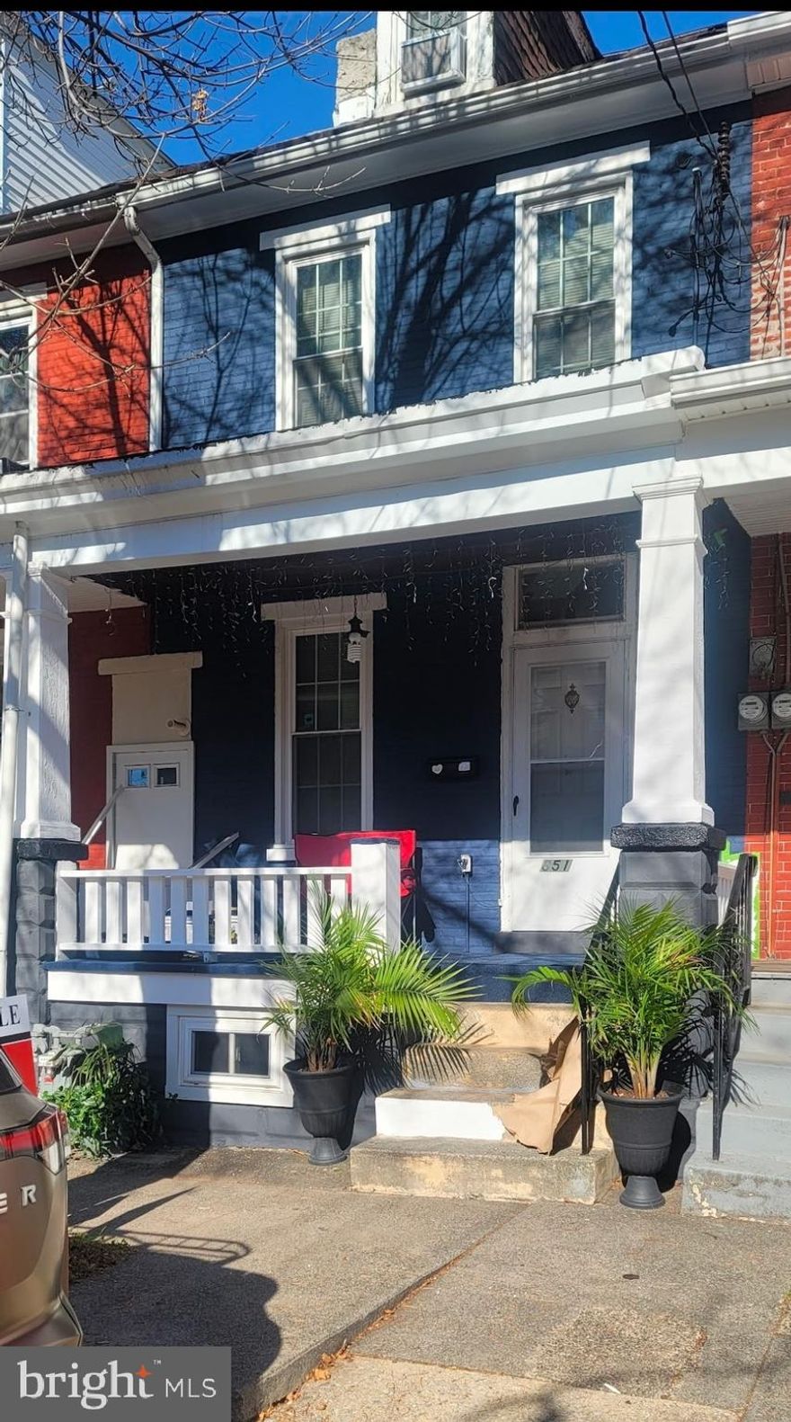 ****UPDATES ARE NOT ALL REPRESENTED***NEW PHOTOS ARE COMING SOON****
Welcome to 851 Queen Street, an updated and beautifully maintained row home located on a quiet, desirable street directly across from the prestigious Hill School in Pottstown Borough. This home blends timeless character with modern upgrades and offers a rare opportunity in one of the borough’s most sought-after locations.

The inviting covered front porch features a newly refreshed exterior color palette that enhances the brick façade with a modern, elevated feel. Inside, the traditional layout flows from the living room to the formal dining area and into the updated kitchen, complete with a dual gas/electric stove hook-up and direct access to the backyard.

Convenient features include a newer washer and dryer, new stainless steel kitchen appliances, a new tankless water heater with Bluetooth temperature control. The second floor hosts two comfortable bedrooms and a fully renovated full bathroom with stylish contemporary finishes. A standout feature is the expansive finished third-floor attic, offering flexible space ideal as a primary suite, guest room, office, studio, or playroom.

Outside, enjoy a large fenced backyard, walk-out patio, in-ground garden, and off-alley parking. The home provides updated comfort while still offering a blank slate for the next owner to personalize.

Located near downtown Pottstown’s restaurants, shopping, parks, and the Schuylkill River Trail. Schedule your private tour today.