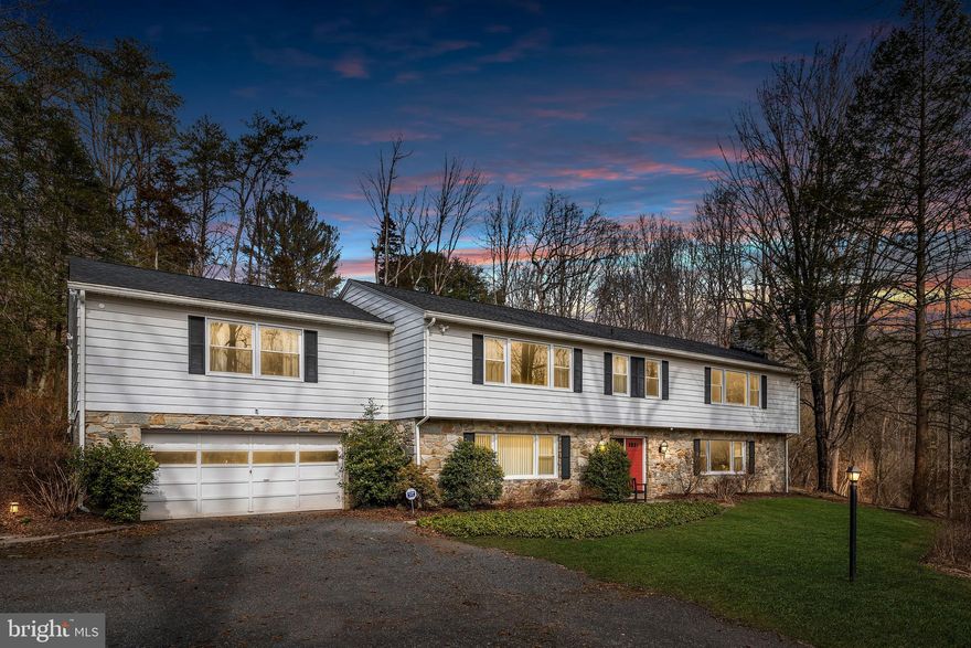 **Spacious 4 Bedroom, 3 full Bath, two-story Raised Rancher with 2 car attached garage and separate in-law quarters offering over 2,600 square feet of finished  living space, situated on just under a two acre lot and conveniently located in highly sought-after Phoenix Maryland.  The long private driveway leads you back to this well-kept home.  Upon entry, from the foyer area with tile flooring, take the stairs to the upper level and the pride of ownership immediately shows.  The 29 x 15 Living Room features gleaming hardwood floors, a fireplace, recessed lighting, crown molding, built-in bookshelves and large windows that provide an abundance of natural light.  Step into the elegant 15 x 15 formal dining room which offers hardwood floors decorative molding and is perfect for large gatherings.  From the dining area enter into the updated eat-in kitchen featuring granite counter-tops, new vinyl flooring, center-island, tumble-stone backsplash and stainless steel appliances with double door refrigerator offering an ice maker and water dispenser. The luxurious 23 x 15 Master Suite, with carpet, is located down the hall and offers a large walk-in closet, crown molding and a sitting area.  The Master Bath has tile flooring, double sinks, a large linen closet, newly updated shower and a stack washer and dryer. Two more generously sized bedrooms and a spacious hall bath with double sinks, large vanity mirror and large linen closet complete the upper level.The massive entry level is perfect for an in-law suite featuring a 27 x 14 Family Room with stone wall fireplace, all new vinyl flooring, a full eat-in kitchen area with electric range, refrigerator, built-in microwave and dishwasher.  The 15 x 14 fourth bedroom is located on the entry level along with a full bath.  Other Amenities and Updates Include: 23 x 12 Three Season Room  located off the kitchen with large windows and beautiful views of nature, Relaxing 23 x 13 Screened-in Patio, 34 x 12 Deck perfect for entertaining and grilling, Newer Roof-3/4 years, All new energy efficient windows, Freshly Painted throughout, Huge back storage room with full size washer and dryer on entry level, alarm is hardwired into the house and installed into new windows, retaining wall replaced 7 years ago, appliances 8 years, new toilet in Master Bath, HVAC-10 Years, Water Heater-10 years, Well Pump-2 years, new gutters with leaf guards, Septic rebuilt inside 5 years ago, Easy commuting with 695, I-83, Jarrettsville Pike, Dulaney Valley Road and York Road all nearby, Loch Raven Reservoir across the road and much more.  Schedule your appointment today!  You won t be disappointed. Welcome Home! Check out the virtual tour (Copy & Paste Link) https://www.searchallproperties.com/listings/2732088/vtour?theme=2&ubd=1