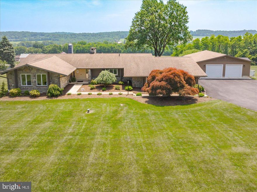 102 Upper Valley Road, Christiana, PA 17509
4,400 Sq Ft | 1.2 Acres | 5 Beds | 4.5 Baths | Scenic Views | In-Law Suite

Discover the perfect blend of modern luxury and countryside serenity at this
stunning contemporary ranch perched on just over 1.2 scenic acres in beautiful
Lancaster County just a few short minutes from Chester County & minutes from
The Enola Low-Grade Trail. With breathtaking panoramic views of rolling hills
and a picturesque valley farm, this home is a rare opportunity for refined rural
living.
The neighboring lot with tax  ID 550-81474-0-0000is to be transferred with the sale. 

Spanning 4,400 square feet, the property is thoughtfully designed with high-end
finishes, spacious living areas, and exceptional indoor-outdoor flow.

Main Home Features:

Beautiful hardwood floors throughout the main level
Gourmet kitchen with black stainless-steel appliances, granite
countertops, and solid hardwood cabinetry
Double-door entry with elegant slate flooring
Expansive family room with gas fireplace and crown molding throughout
and an oversized sliding glass door that leads to a 2 nd story veranda
overlooking the valley
Sunroom with skylights leading to a large deck with sweeping panoramic
views
Primary suite featuring an updated en-suite bathroom with a floor-to-
ceiling tile walk-in shower, ceramic floors, and a custom oversized walk-
in closet with built in shelves and storage cubby’s

Showstopping In-Law Suite / au Pair Suite (Just a Few Years
Old):

This newly built, luxurious in-law/au pair suite feels like a private retreat all its
own:

Vaulted ceilings and recessed lighting create a bright, open space
Full-size kitchen with brand-new stainless-steel appliances, quartz
countertops and a spacious pantry
Oversized bedroom with walk-in closet and cleverly designed hidden
cubby storage
Private full bath with its own washer & dryer, dedicated living space, and
walk-out access to the deck with panoramic countryside views

Lower Level:
Second living room with gas fireplace and kitchenette
Full bath and a half bath
Cedar closet
Laundry area
Walk out access to a paver patio and the home’s relaxing hot tub area

Additional Upgrades & Features:
New insulated, climate-controlled, oversized two-car detached garage
with water line & interior floor drains Oversized driveway for ample parking Diamond Line factory-series water treatment system with reverse osmosis
system
80-gallon Rheem Marathon electric water heater
Constant pressure well pump system
Carrier Infinity hybrid heat pump & propane furnace with Aprilaire whole
house humidifier, media filter & Air Scrubber air purifier
Maintenance free exterior of the home with new vinyl siding, soffits, and
gutters and downspouts
This is not just a home, it’s a lifestyle. Whether you’re hosting guests,
accommodating multigenerational living, or simply enjoying the peaceful
countryside, 102 Upper Valley Road offers unmatched value and beauty.
Lot with tax ID 550-81474-0-0000 will be transferred with the sale.

Don’t miss your chance—schedule a private showing today!