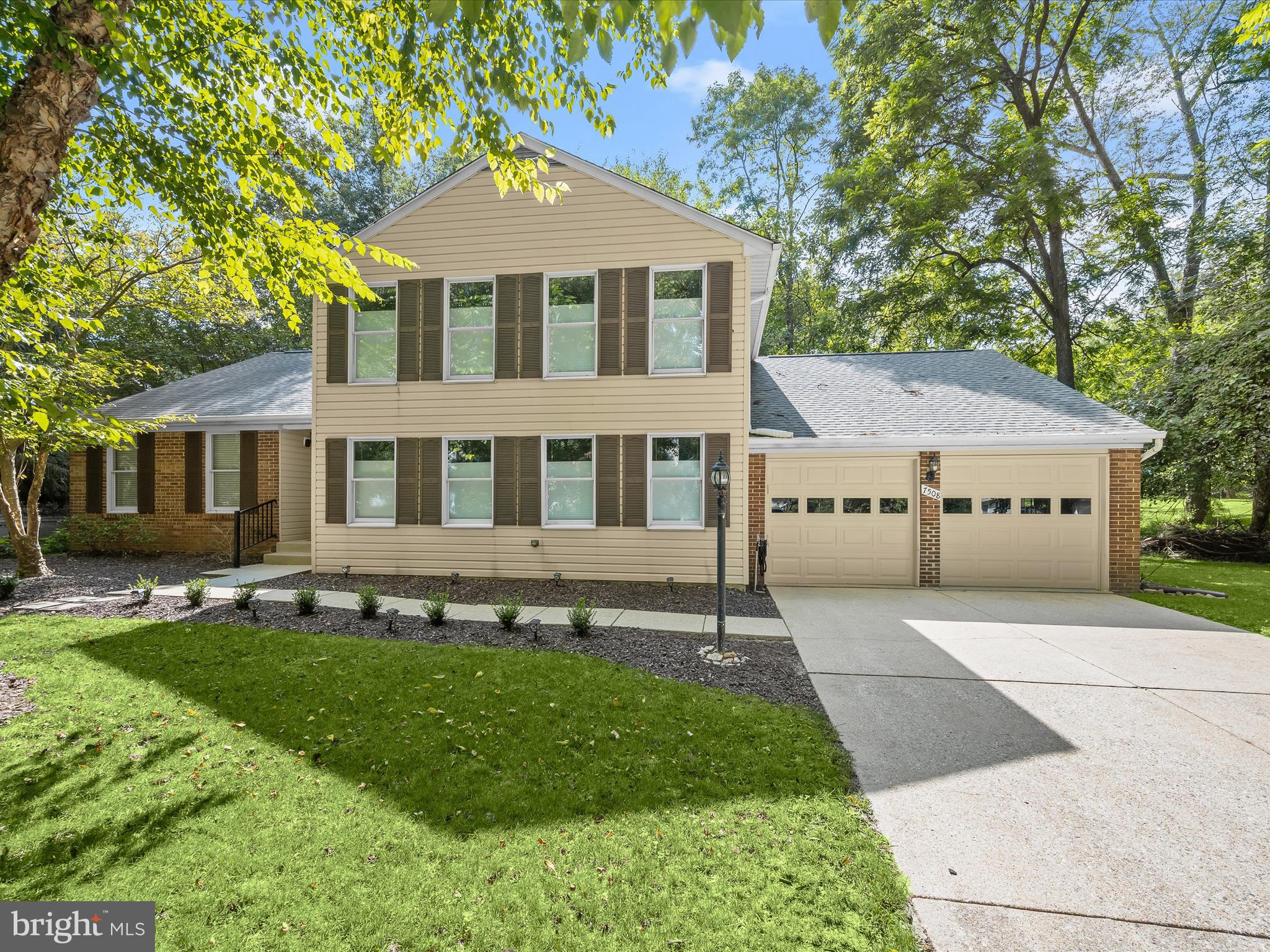 Welcome home to 7508 Broadcloth Way in the heart of Columbia’s desirable Village of Kings Contrivance. Sited on an impressive 1/3 acre lot, this four-level home offers over 3,000 square feet of beautifully refreshed and updated living space. Enjoy new luxury vinyl plank flooring, new kitchen appliances, designer light fixtures, and a fully fenced yard backing to mature trees providing privacy and tranquility. A new roof and and new HVAC system were both installed in 2020. Sunlight streams into every room including a convenient entry-level bedroom suite with a walk-in closet, a full bath, and its own private outdoor access. The bright and airy foyer opens to a formal living room and a step-up dining room, while the eat-in kitchen features attractive quartz countertops, new stainless steel appliances, and easy access to the expansive deck via large sliding glass doors. A brick-surround wood-burning fireplace is the focal point of the inviting family room, which also provides direct deck access. A sizable recreation room with a wall of windows, a convenient half-bath and a laundry room complete the main level.
Ascend the stairs to the primary suite, complete with two walk-in closets and a full bath boasting a soaking tub, separate shower, and dual vanity. Two additional bedrooms and a full bath are also located on the upper level. The lower level of this property is unfinished and ready for your own personal customization. Ideally located just minutes away from the community shopping center and major area commuter routes including 32, 29, and I-70 — 7508 Broadcloth Way won’t last long.