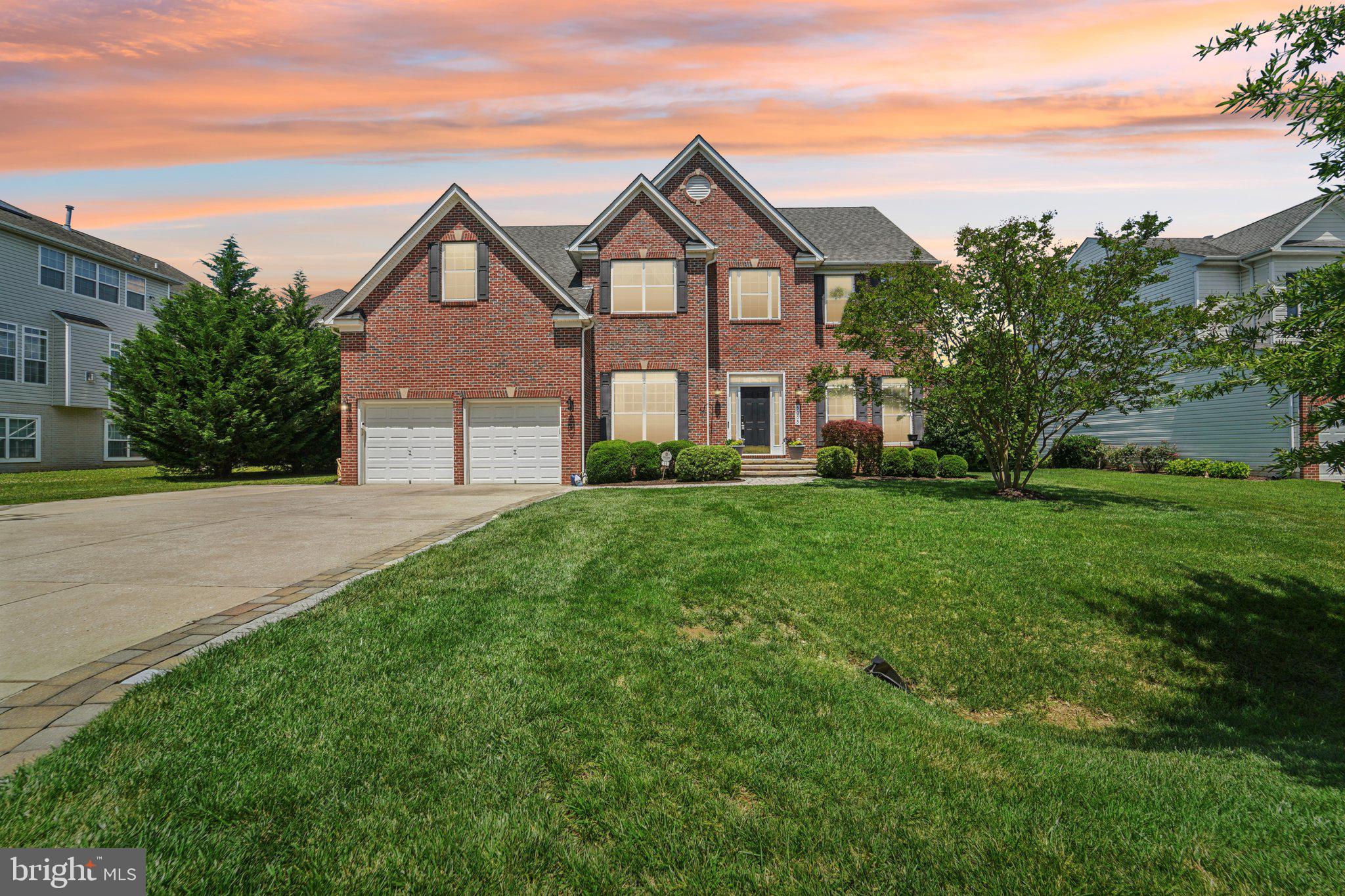 Welcome to this stately brick-front executive colonial, nestled on a picturesque street in the sought-after Cider Mill community. This meticulously maintained home offers expansive living spaces and is filled with high-end upgrades designed for modern comfort and style.
The heart of the home is the stunning gourmet kitchen, beautifully renovated in 2019 with Silestone Statuario countertops, resurfaced cabinets and GE Profile stainless steel appliances—including double wall ovens (2023), a glass cooktop with downdraft (2023), and a GE refrigerator (2023). A custom marble backsplash and updated pantry add both function and flair, while oak hardwood floors flow through the kitchen, entryway, and powder room, setting a sophisticated tone.
The show-stopping two-story family room features dramatic decorative windows, a ceiling fan, and a cozy gas fireplace—perfect for relaxing or entertaining. The main level also boasts a formal dining room, spacious living room, private study, and a stylish powder room with a pedestal sink. A convenient mudroom with upgraded washer and dryer (2022), along with recent mechanical updates including a new HVAC system (10/23) and hot water heater (9/24), offer peace of mind and efficiency.
Upstairs, the light-filled primary suite includes a generous bedroom, a large walk-in closet, and a spa-like en suite bath with dual vanities, a glass-enclosed shower, and a soaking tub. Three additional bedrooms, a full hall bath and plush neutral carpeting complete the light -filled upper level.
The fully finished lower level is an entertainer’s dream, featuring a plush theater room, expansive recreation area, full bathroom, and abundant storage. Outside, enjoy a flat, private backyard lined with mature trees—an ideal setting for outdoor gatherings or peaceful retreat.
Cider Mill residents enjoy access to scenic walking and biking trails and a tranquil community pond, making this the perfect place to call home.