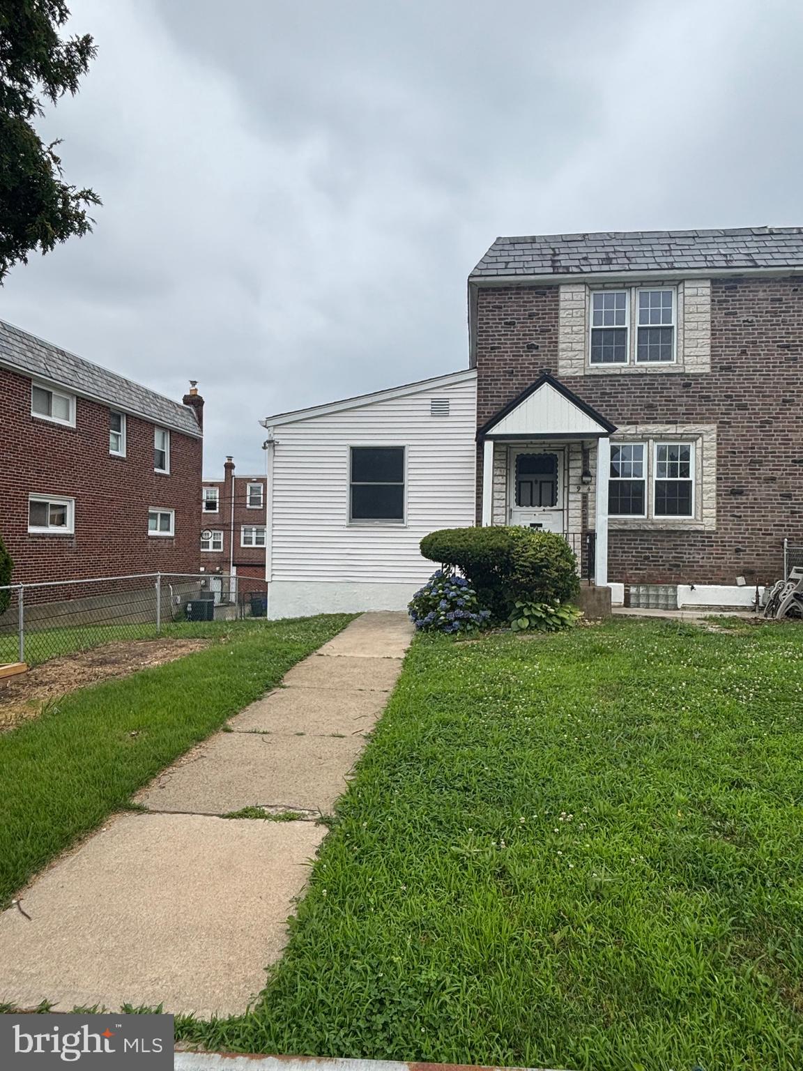 This 4 bedroom 2 bathroom twin has the potential for a 5th bedroom or living space in the walk out basement. There is also a one car garage, front and rear yard. Brand new floors and carpets in majority of home. Close to public transportation, restaurants and stores. Central location to all of Delaware county and the city.