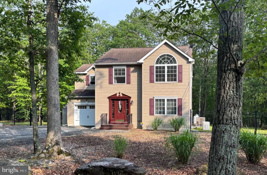 EXCEPTIONALLY WELL MAINTAINED HOUSE AND PROPERTY, FURNISHED MOVE IN READY!
QUICK/EASY COMMUTER ACCESS TO ROUTES 80 EAST AND 80 WEST.  Located in the private community of Pocono Highland Estates, nestled in the charming town of Henryville, PA.  Step inside this spacious four bedroom, two and one half bathroom home, and prepare to be amazed. Expansive primary bedroom has an ensuite bathroom a walk in closet and a sitting area. 3 more bedrooms, full bathroom along with a laundry area behind double doors with a washer and dryer upstairs. With just under 2,000 square feet, there is plenty of room for everyone to spread out and relax. The open floor plan creates a seamless flow throughout the home, making it ideal for entertaining guests or spending quality time with loved ones. --As you explore the interior, you'll appreciate the attention to detail and the array of high-end finishes. The gourmet kitchen is a chef's delight, featuring new stainless steel GE appliances, five burner gas stove and large kitchen island. The living area boasts a great open concept, providing a cozy and inviting atmosphere. York HVAC electric heat pump powers central AC and heat, propane on site powers the gas stove and the whole house 22KW Generac generator which ensures comfort during all seasons and all types of weather. The amount of natural light coming through the generous amount of windows adds a touch of elegance.  A complete home UV water filtration system purifies your own private well water. Additional upgrades not to be outdone include a complete home security system, leaf guard gutters, and fully finished garage with automatic garage door. --When stepping outside onto your deck you can enjoy breathtaking views of the surrounding landscape and your 1.16 acre corner lot. The 5 ft tall black metal fenced in the backyard makes it perfect for hosting summer barbecues or simply unwinding after a long day. The landscaped yard offers a peaceful oasis where you can truly relax and connect with nature. --The Private Community of Pocono Highland Estates is renowned for its natural beauty and outdoor recreational opportunities. Only minutes away from many Pocono Mountain attractions including Camelback Resort, Great Wolf Lodge, and  Kalahari Resorts where purchasing year round seasonal passes are an option for local residents to enjoy hotel recreational indoor and outdoor  activities and amenities. Nearby is Mount Airy Casino Resort with a golf course designed by Hal Purdy named by Sports Illustrated “The best 18 golf holes” in America along with The Pocono Premium Outlets which offer shopping at over 100 stores. All this gives you a wide variety of choices for entertainment, dining and nightlife. Hiking, fishing, mountain biking, rafting, kayaking, and boating are all within minutes for your total outdoor fun and experiences. HOA takes care of all road maintenance, snow/ice removal, common area maintenance, and even stocks the two 2 lakes/ponds with Trout each year!! -Don't miss the opportunity to make this lovely extraordinary home yours. Contact us today to schedule a private showing and experience the beauty and tranquility of Pocono Highland Estates living firsthand.  Act now and start creating memories that will last a lifetime in this remarkable home.