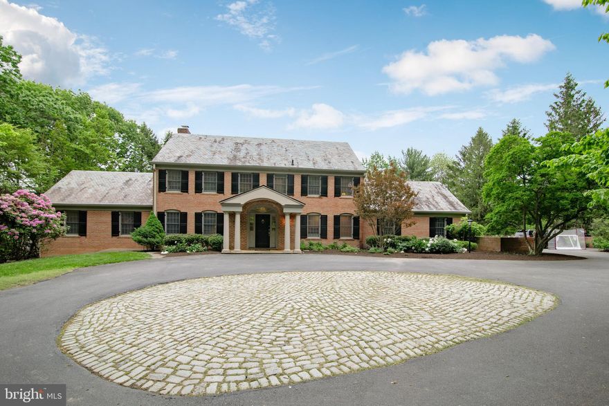 Inviting Potomac Falls home on 2+ glorious acres of lush sweeping lawns of the most desirable lot which cradles a well-proportioned home with over 5600 SqFt of finished space... greenhouse and more! Gorgeous courtyard entrance to foyer and lots of light throughout home. Main level master suite w/Library. 5 bedrooms on second level including private guest room & huge playroom. Tranquil baths and powder rooms. Lots of counterspace in kitchen.  Fabulous, Lower-Level Recreation Room opens to charming Loggia for entertaining beside beautiful, self-cleaning pool. This home has it all!!! Separate staircase for In-Law/Au Pair Suite/Home Office. Easy access to Clara Barton Pkwy, Great Fall Park, C&O Canal!