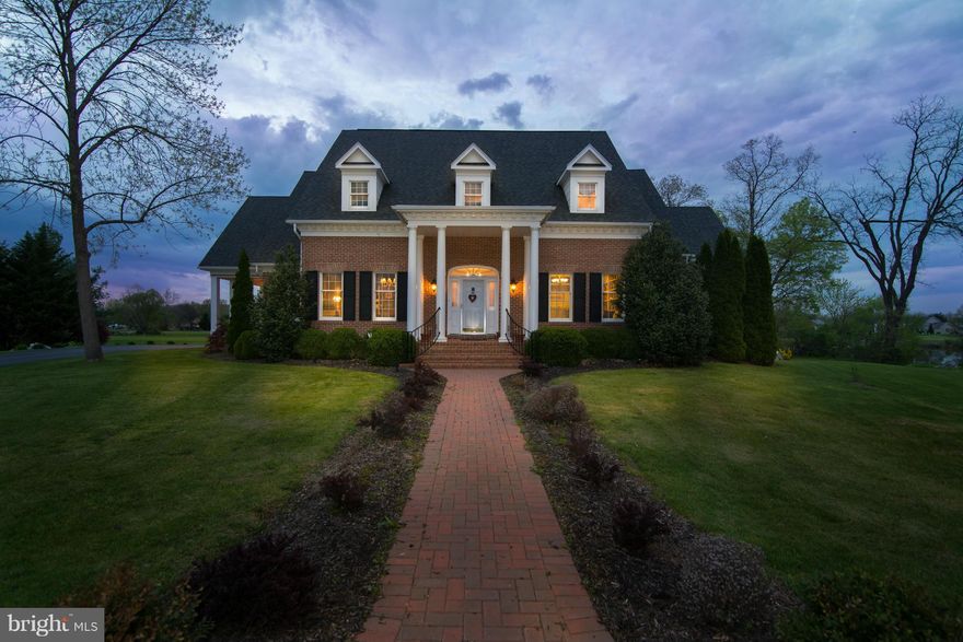 REDUCED $20,000 AND PRICED TO SELL!!! EXQUISITE BRICK CUSTOM BUILT CAPE COD, LOCATED ON CUL-DE-SAC WITH 2 PORCHES OVERLOOKING #8 FAIRWAY & GREEN. 1ST FLOOR MASTER SUITE W/ SITTING ROOM / 2 STORY GREAT ROOM / IMPRESSIVE STUDY / 2ND FLOOR MASTER SUITE AND TWO OTHER SPACIOUS BEDROOMS W/ SITTING AREAS / EXPANSIVE EAT-IN KITCHEN W/ ISLAND & PANTRY / 2 WATER HEATERS / LOTS OF STORAGE  & MORE..