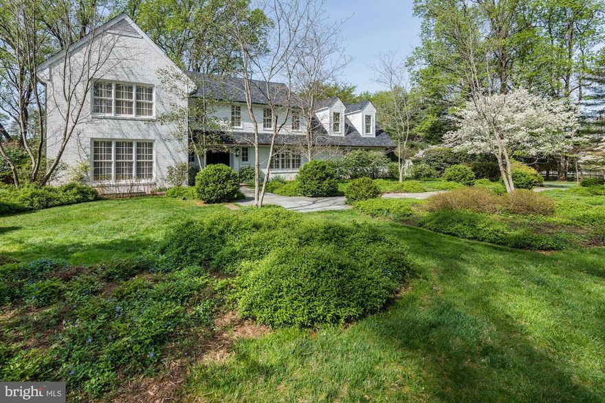 Welcome to this rarely available, classic, Greenwich style, painted brick colonial nestled on an absolutely stunning, almost three acres in the exclusive Bradley Farms area known as the"Gold Coast of Potomac." Ideally located, this property offers the best of everything: a stunning, central location, easy access to airports and to downtown Washington, older charm and character with modern amenities.The beautiful grounds will take your breath away. Filled with perennials and specimen plantings, the landscape is a dream come true! Imagine a summer garden party under the towering trees, cocktails in the topiary gardens then dinner on the terrace with twinkling lights sparkling on the tables and the floral fragrance from the border gardens infusing the air. Throughout the seasons enjoy the expansive view of the gardens from the light-filled Family Room. This home delights year round!  Special features include a large potting shed and a barn that could be a fantastic pool house, artist's studio or writer's escape. Bring your dreams and  make this special estate yours today! Whitman School Cluster