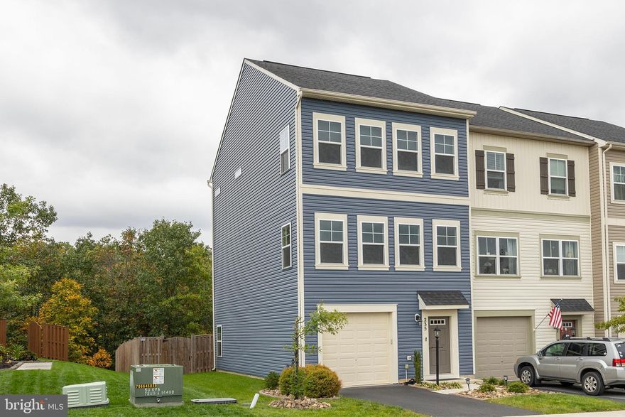 GREAT OPPORTUNITY to own this 3 bedroom 2 full bath/2 half bath  end-unit townhome.   Nicely landscaped  front entry and yard,  with a fully fenced  rear yard. Kitchen has center island viewing living/dining areas, with access the spacious deck. This home has been meticulously maintained!  More professional photos coming soon!